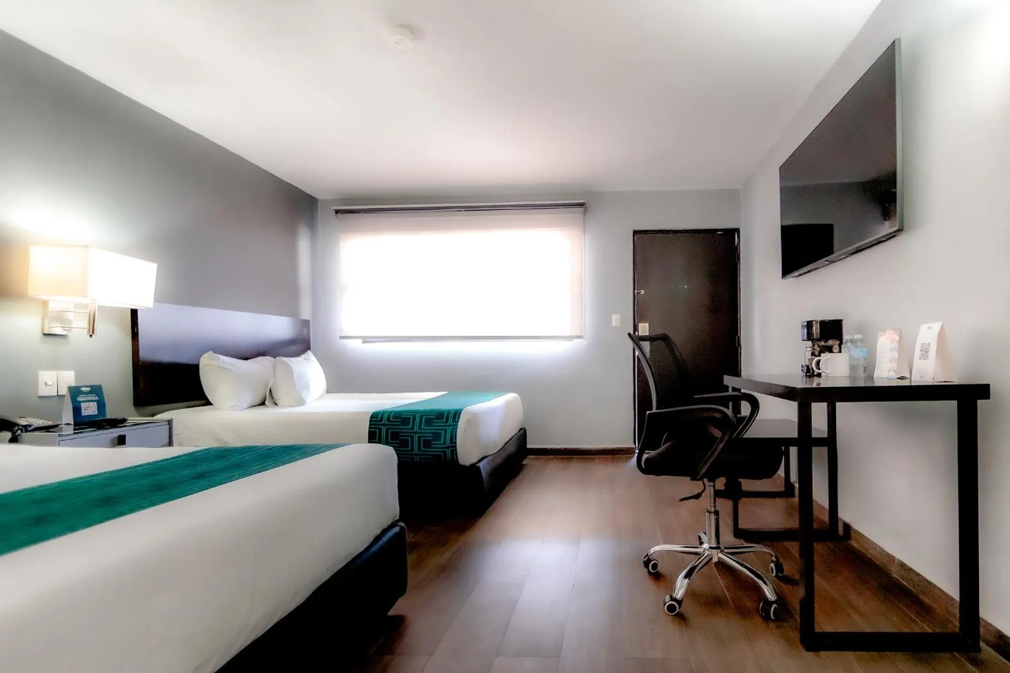 Bed in InHouse Hotel Obregón