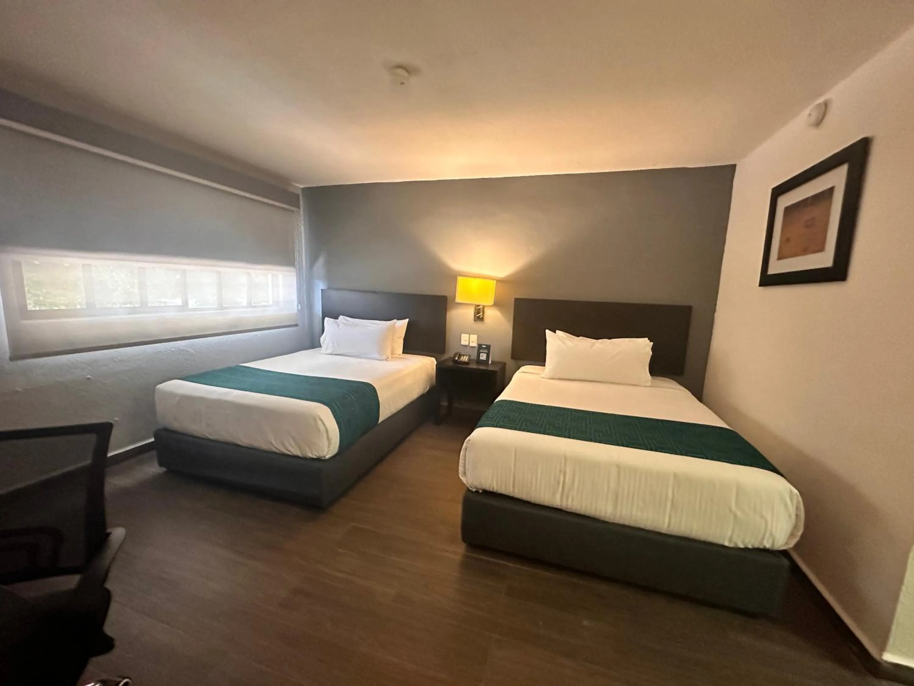 Bed in InHouse Hotel Obregón