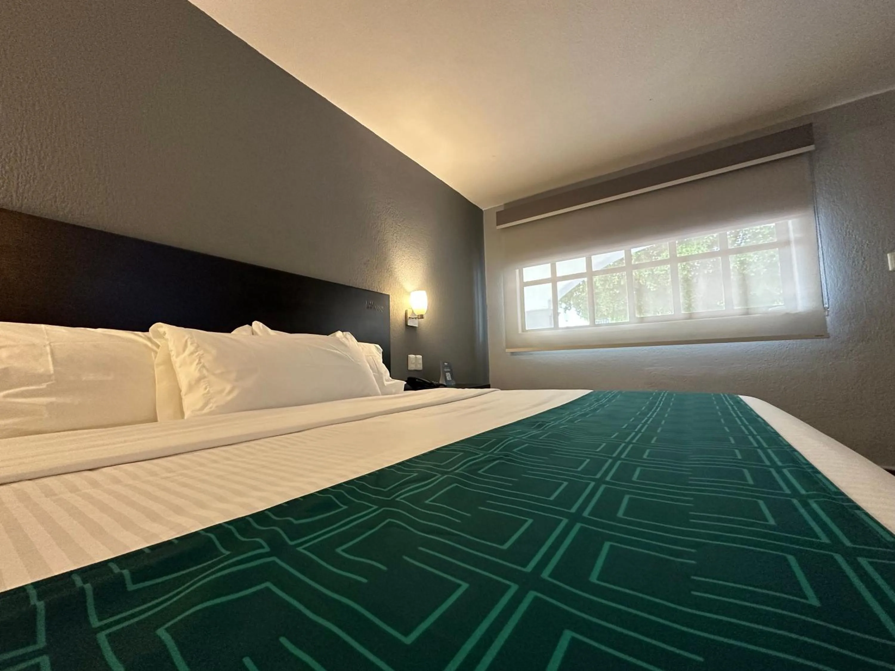 Bed in InHouse Hotel Obregón