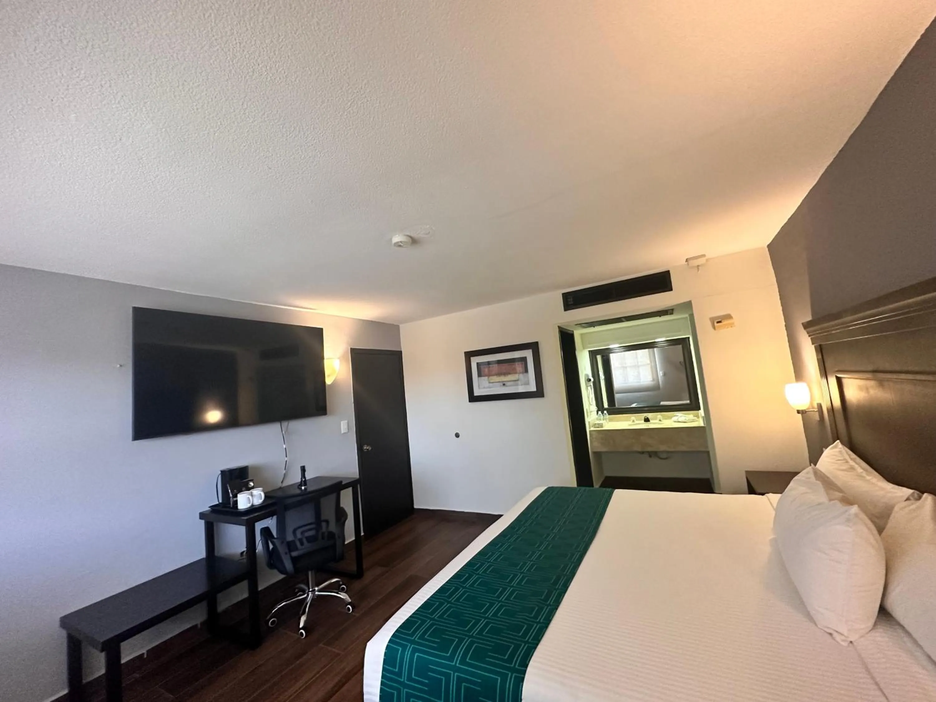 Bed in InHouse Hotel Obregón