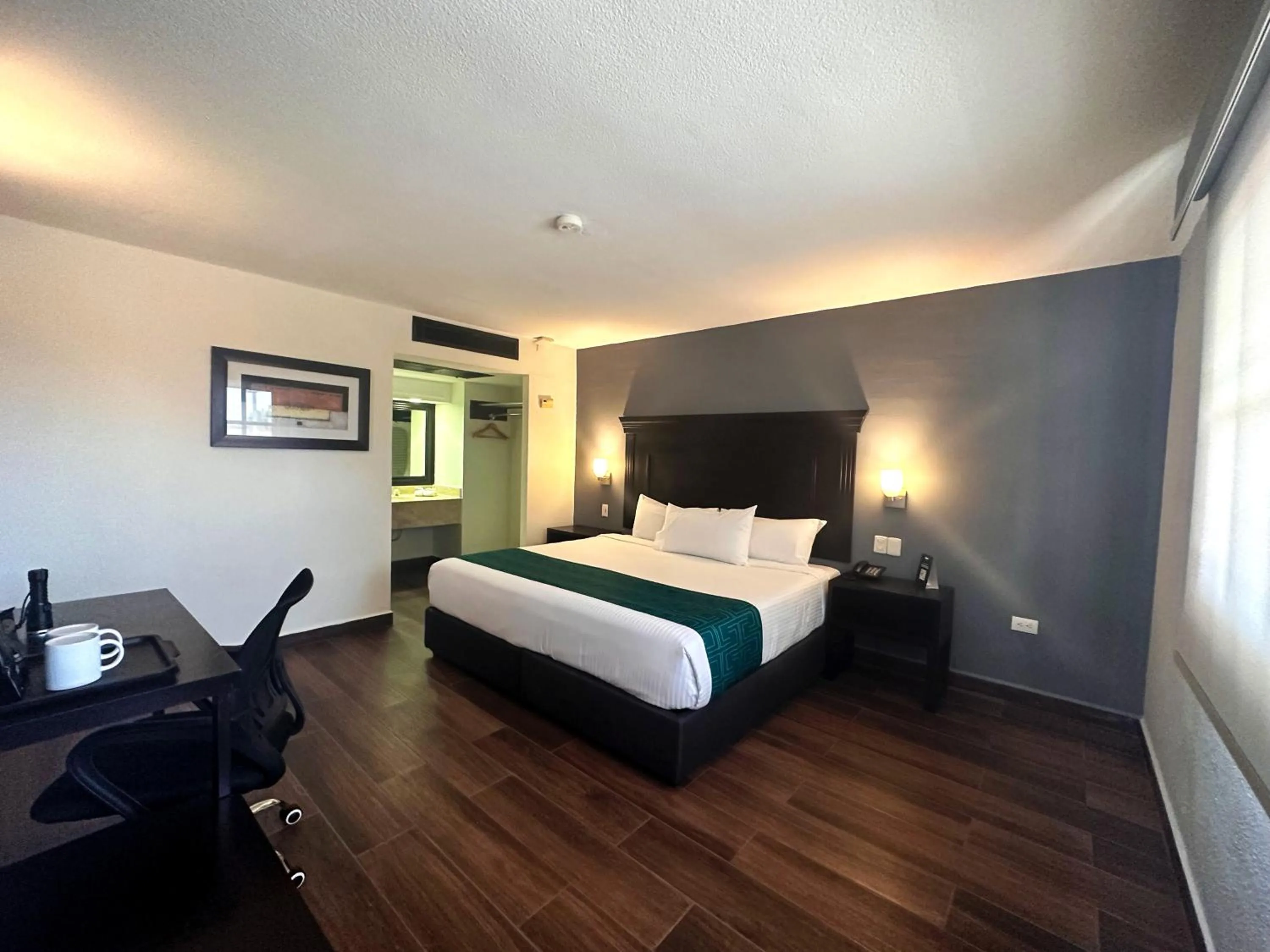 Bed in InHouse Hotel Obregón