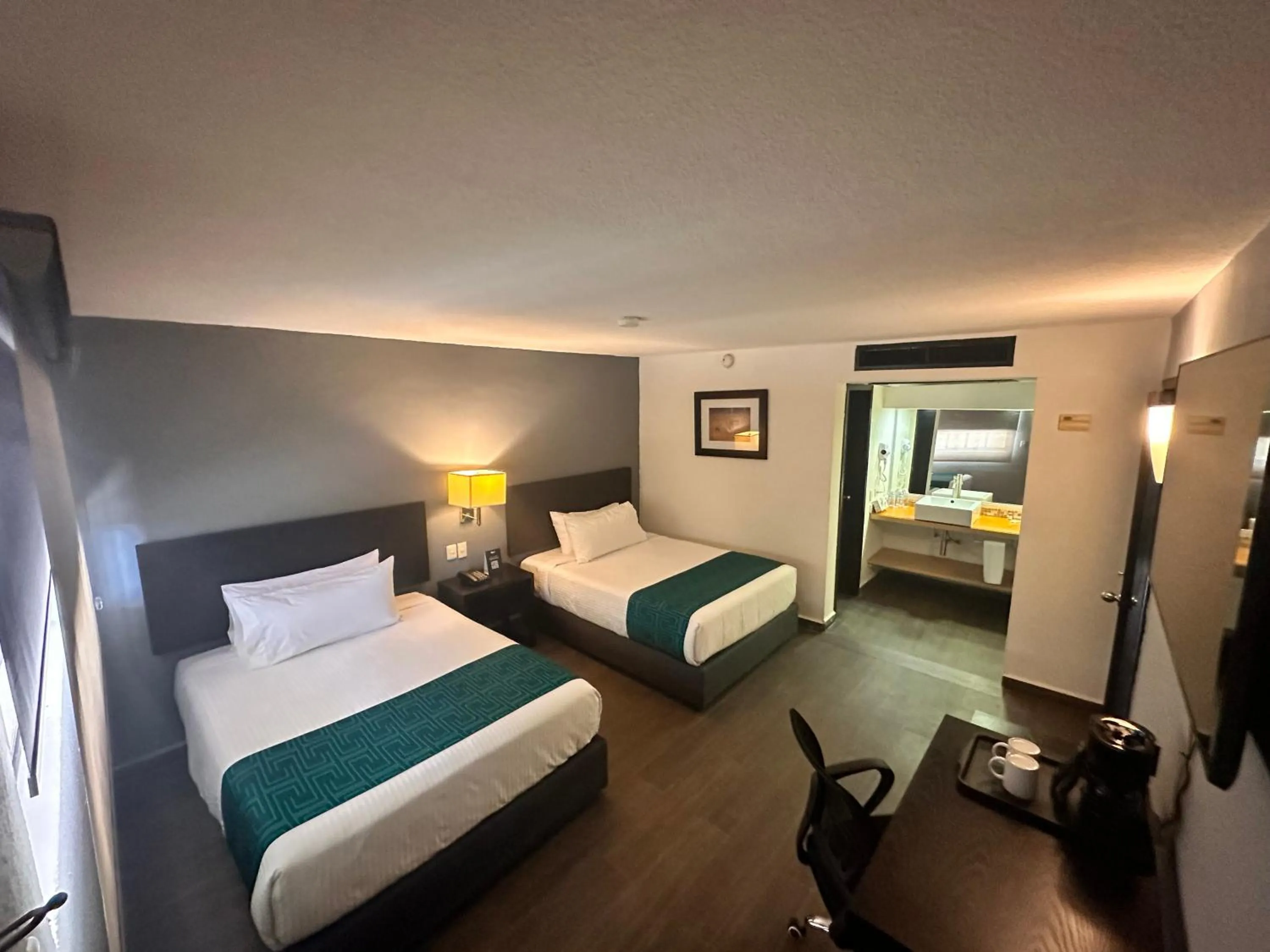 Bed in InHouse Hotel Obregón