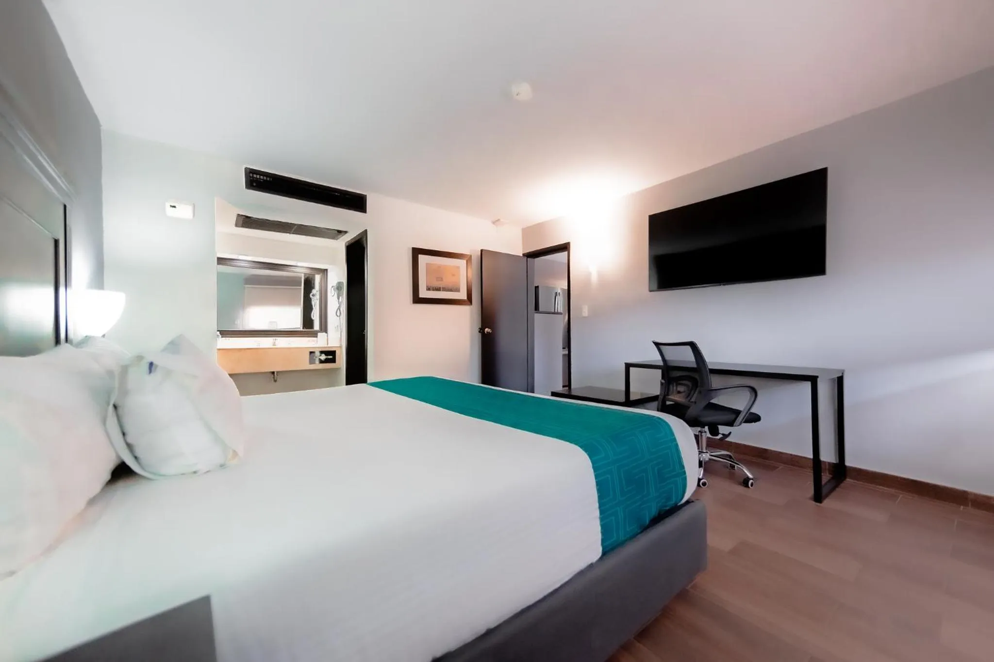 Bed in InHouse Hotel Obregón