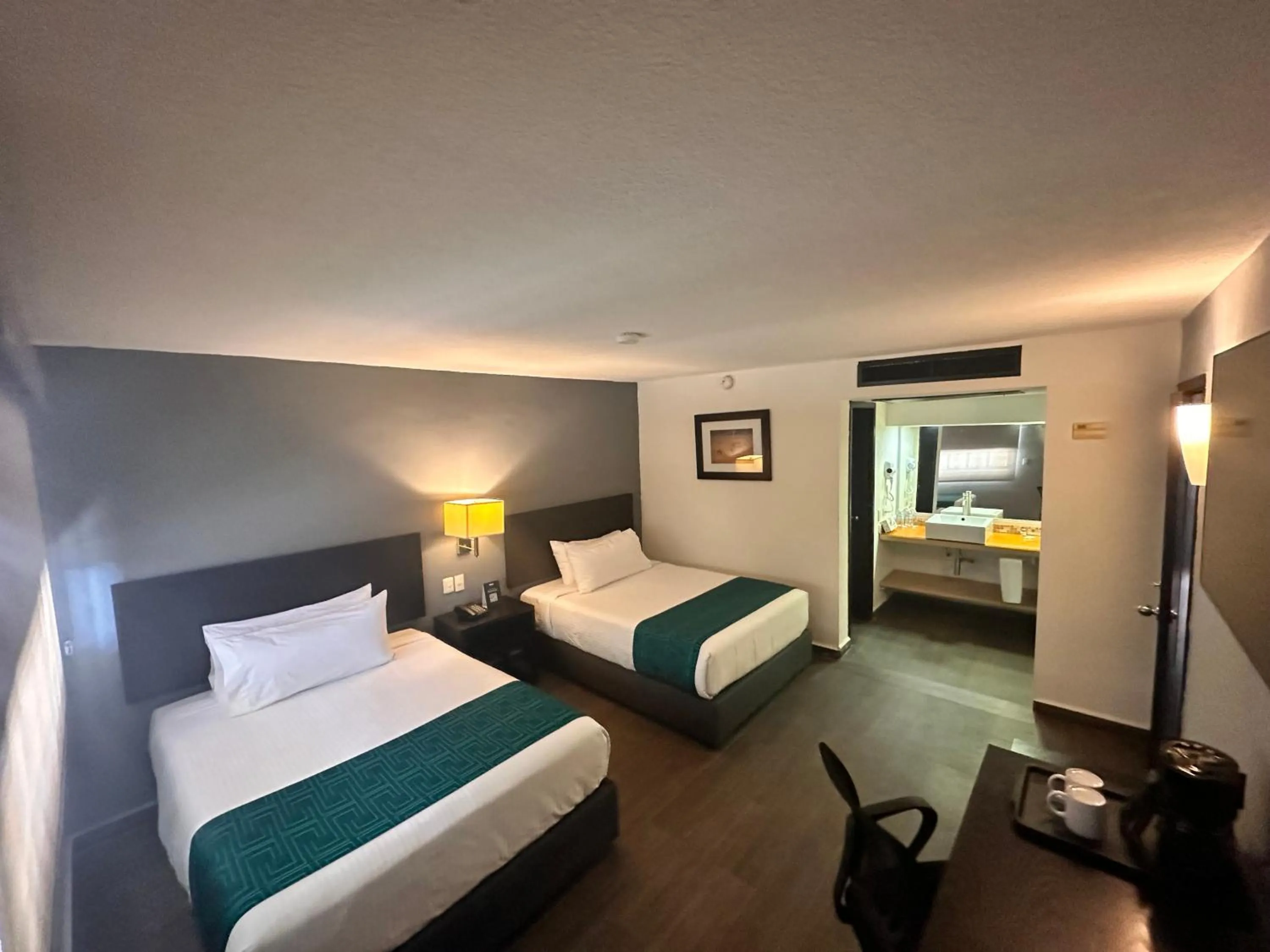 Bed in InHouse Hotel Obregón