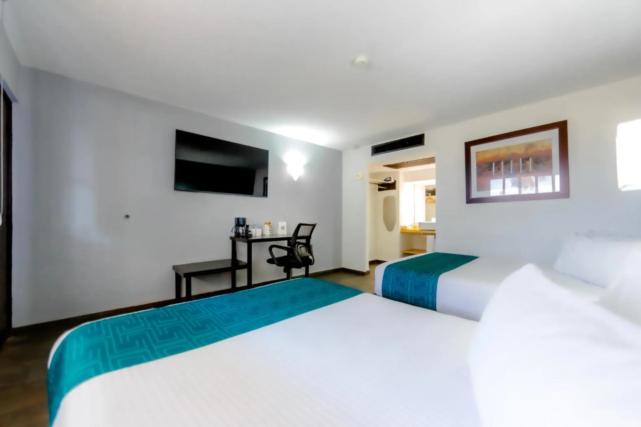 Bed in InHouse Hotel Obregón