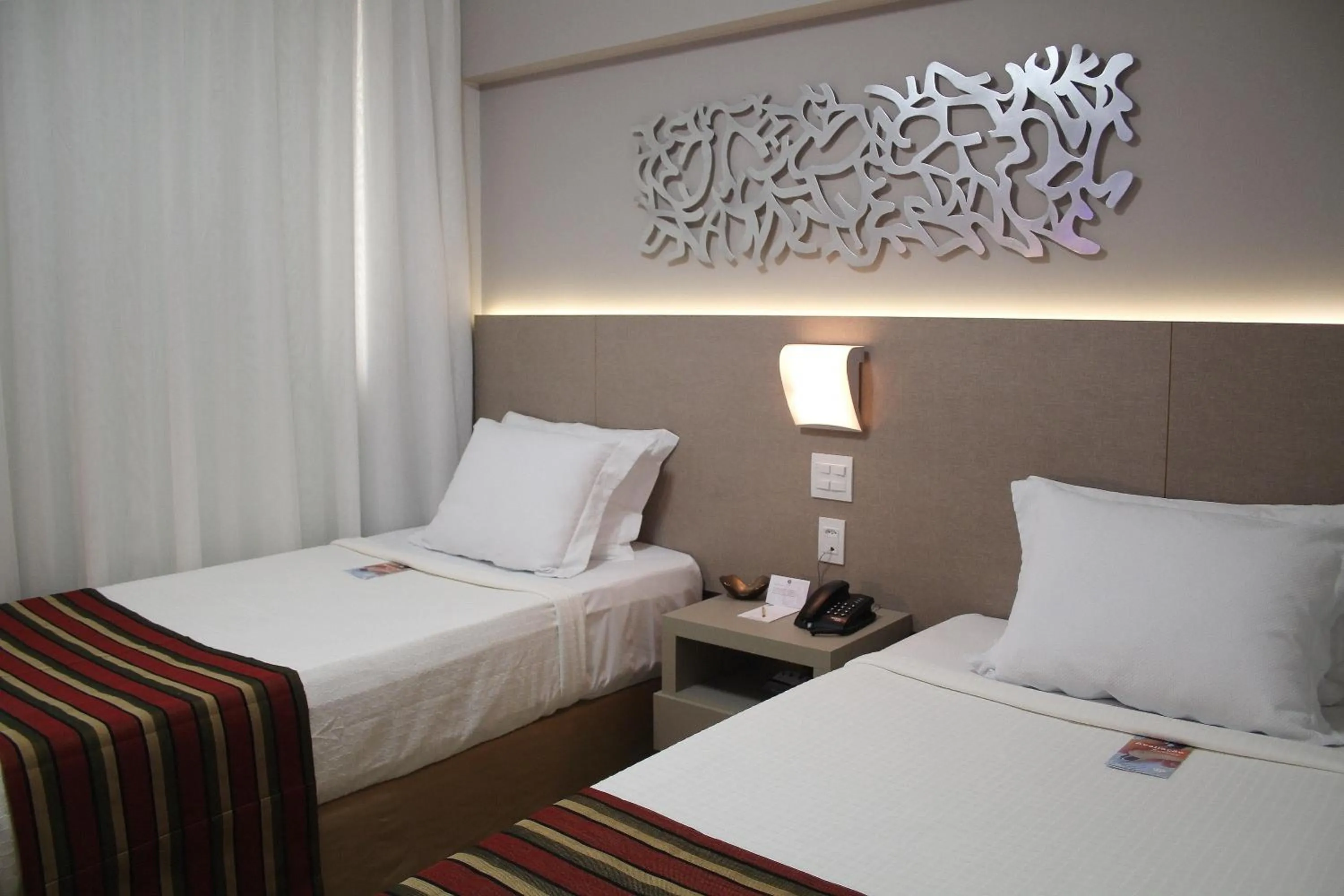 Bed in Hotel Beaga Convention Expominas by MHB