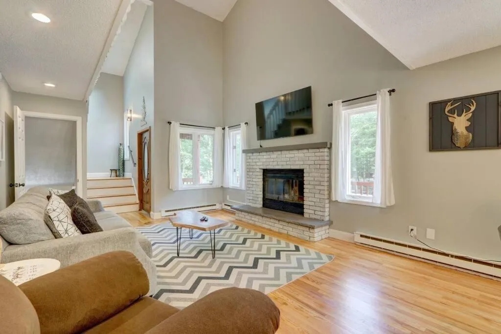 Living room in Cozy Chalet Game Rm and Fireplace