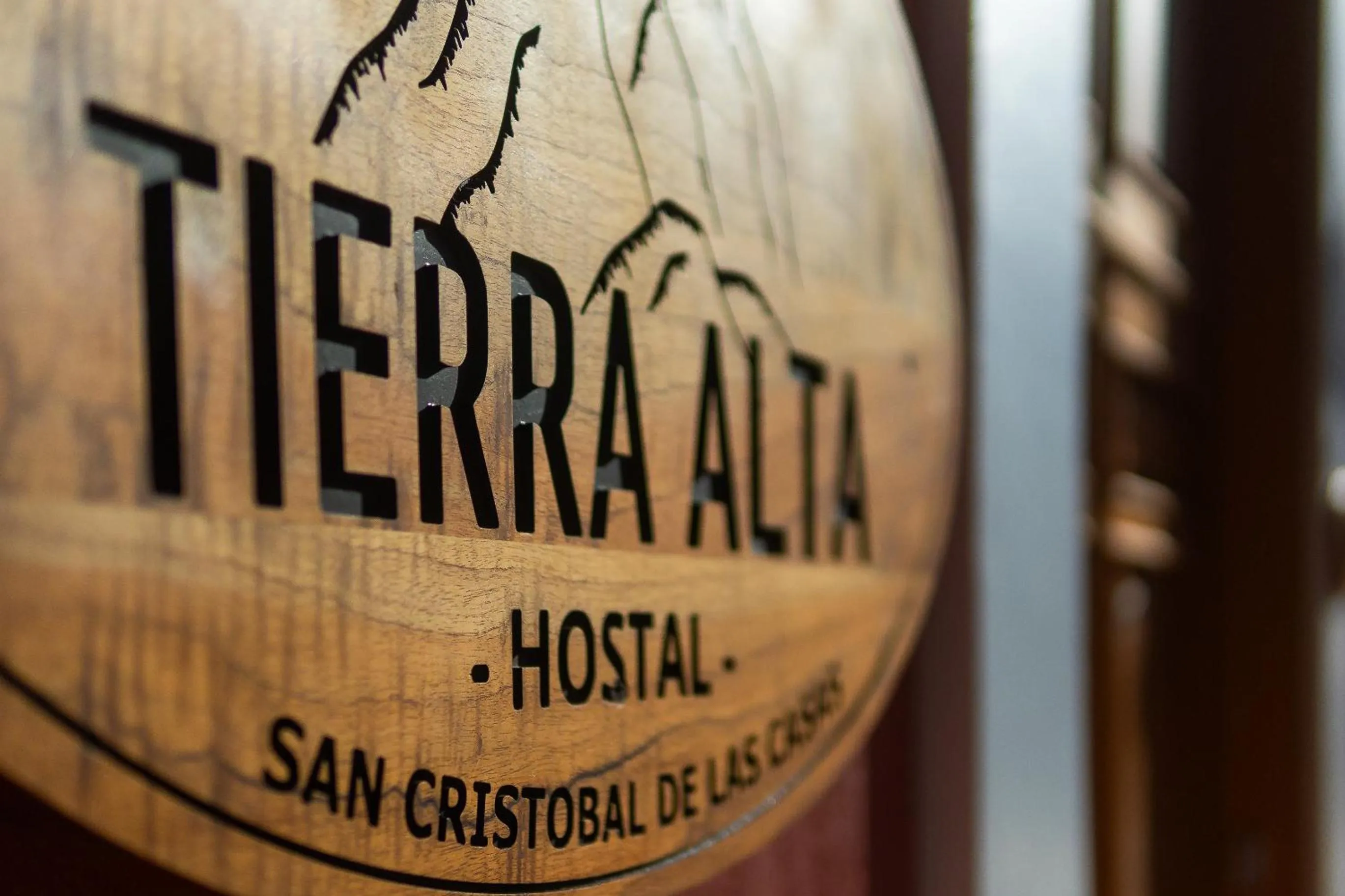 Property logo or sign in Tierra Alta Hostal