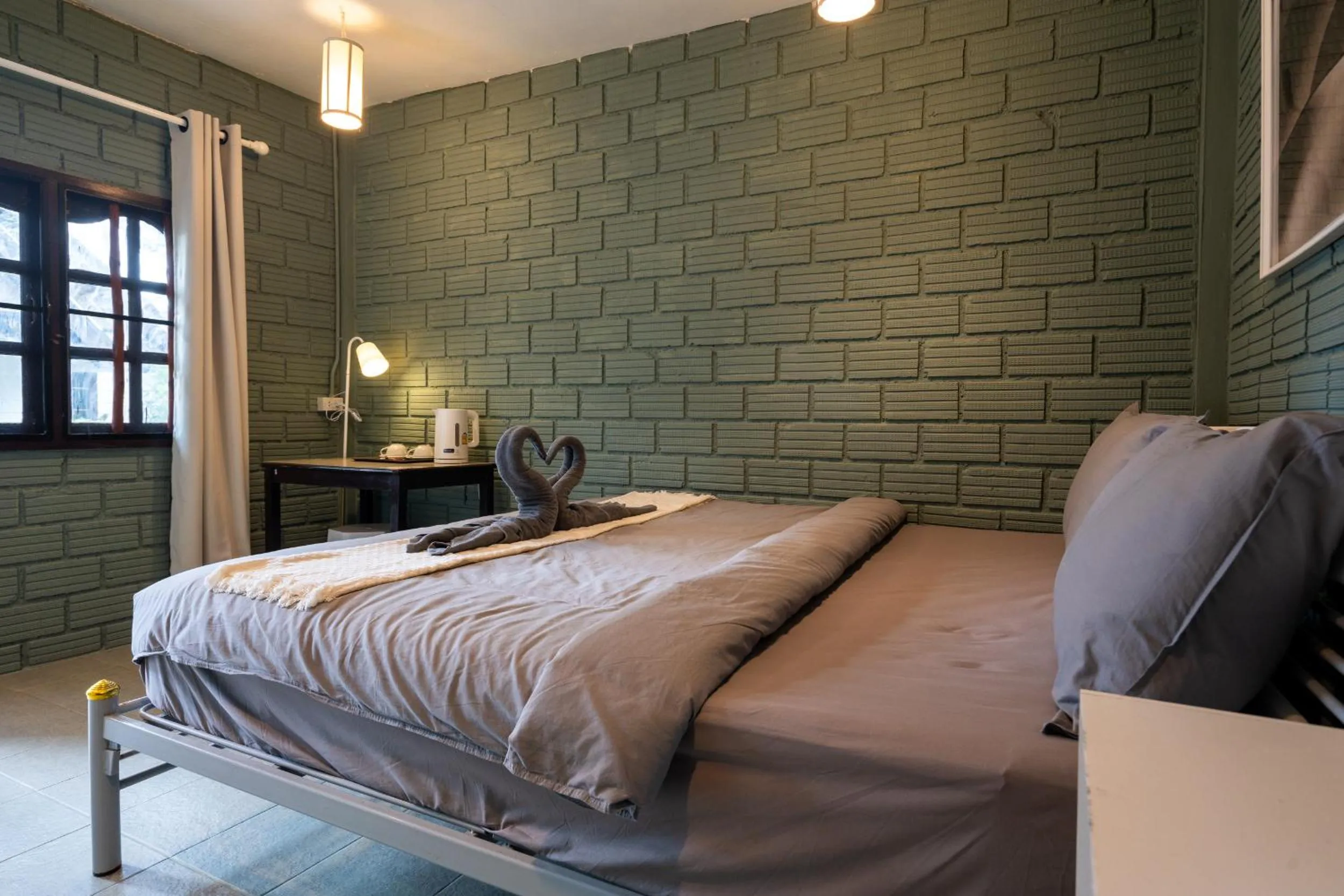 Bed in Breeze Bungalows