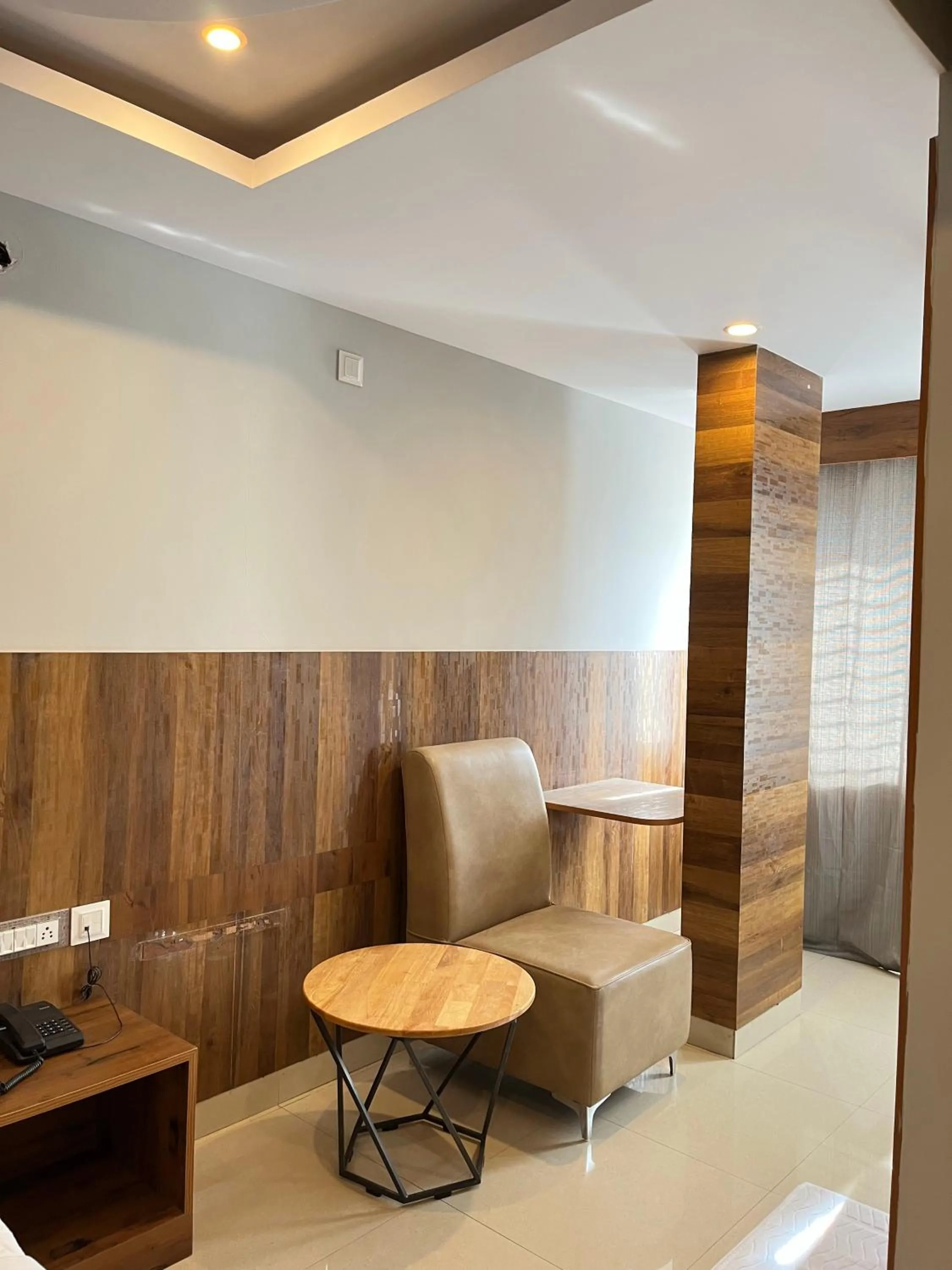 Seating area in Hotel Avenue Suites Near International Airport Bangalore