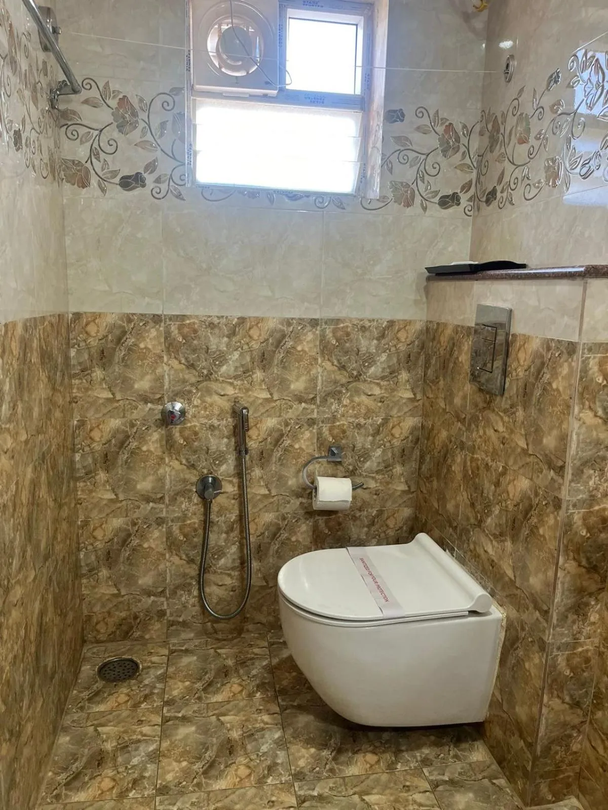 Toilet in Hotel Avenue Suites Near International Airport Bangalore