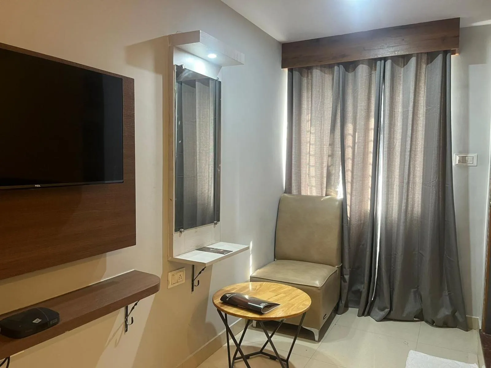 TV and multimedia in Hotel Avenue Suites Near International Airport Bangalore
