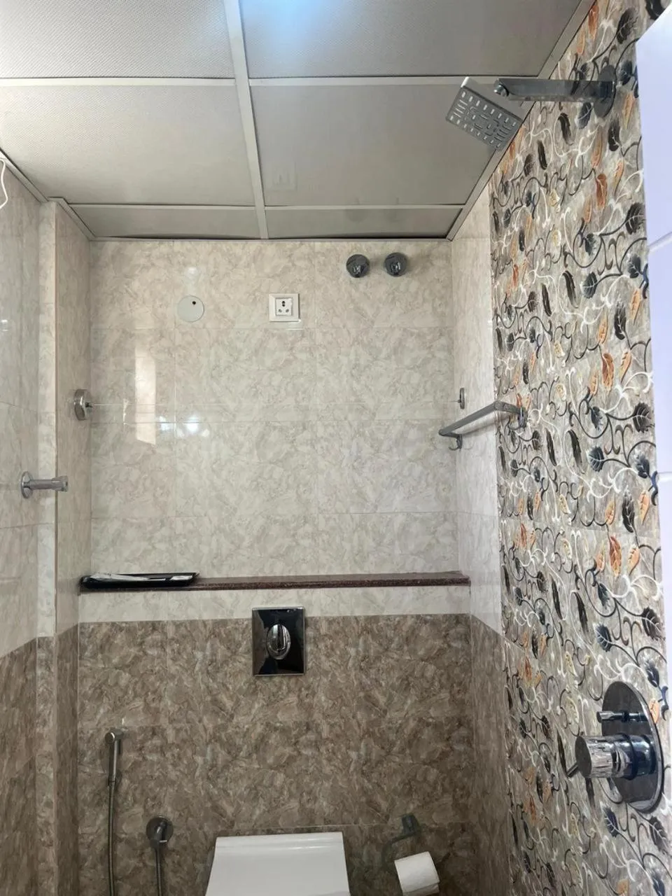 Shower in Hotel Avenue Suites Near International Airport Bangalore