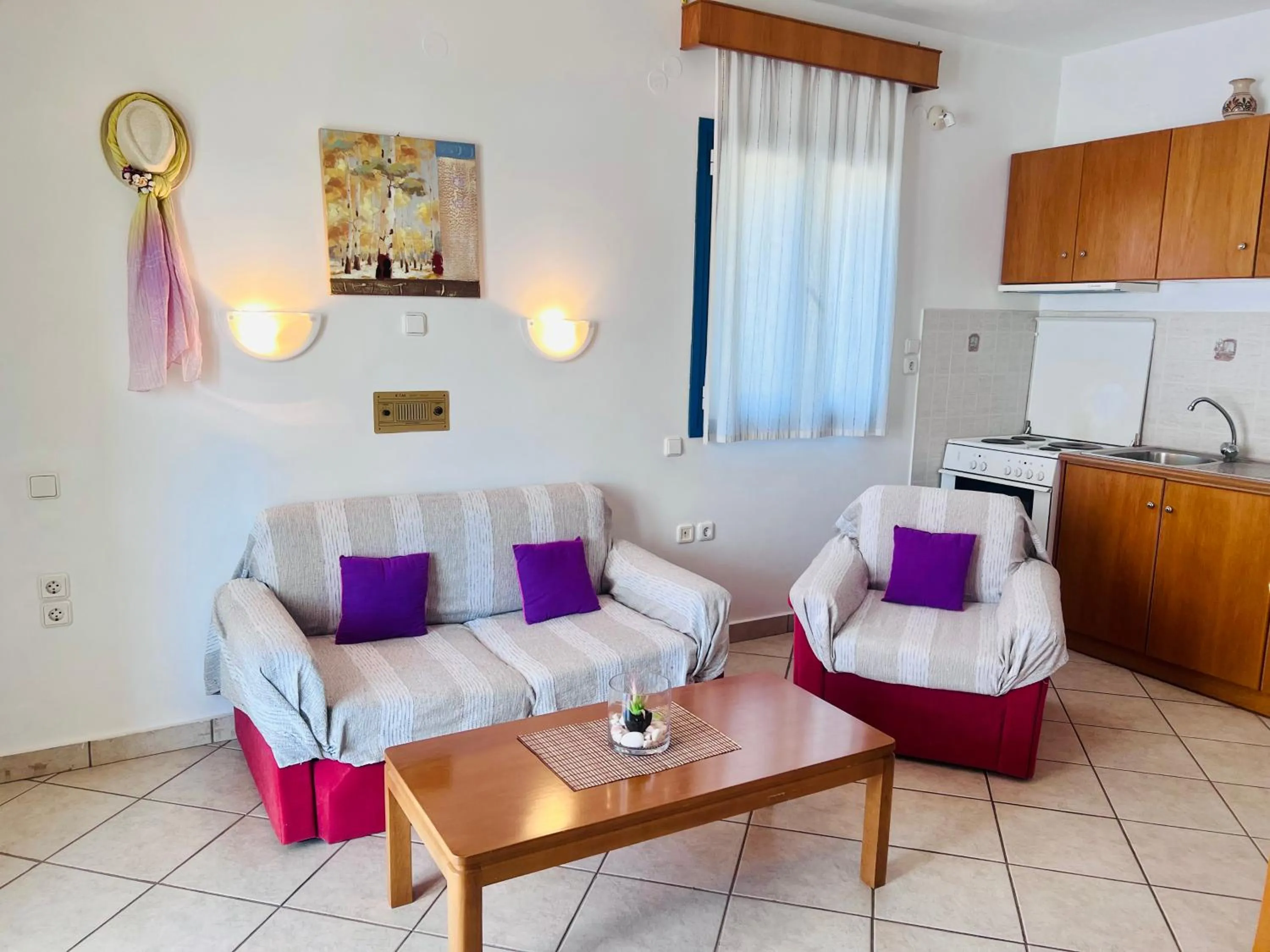 Seating area, Bed in KTM Sunny Villas