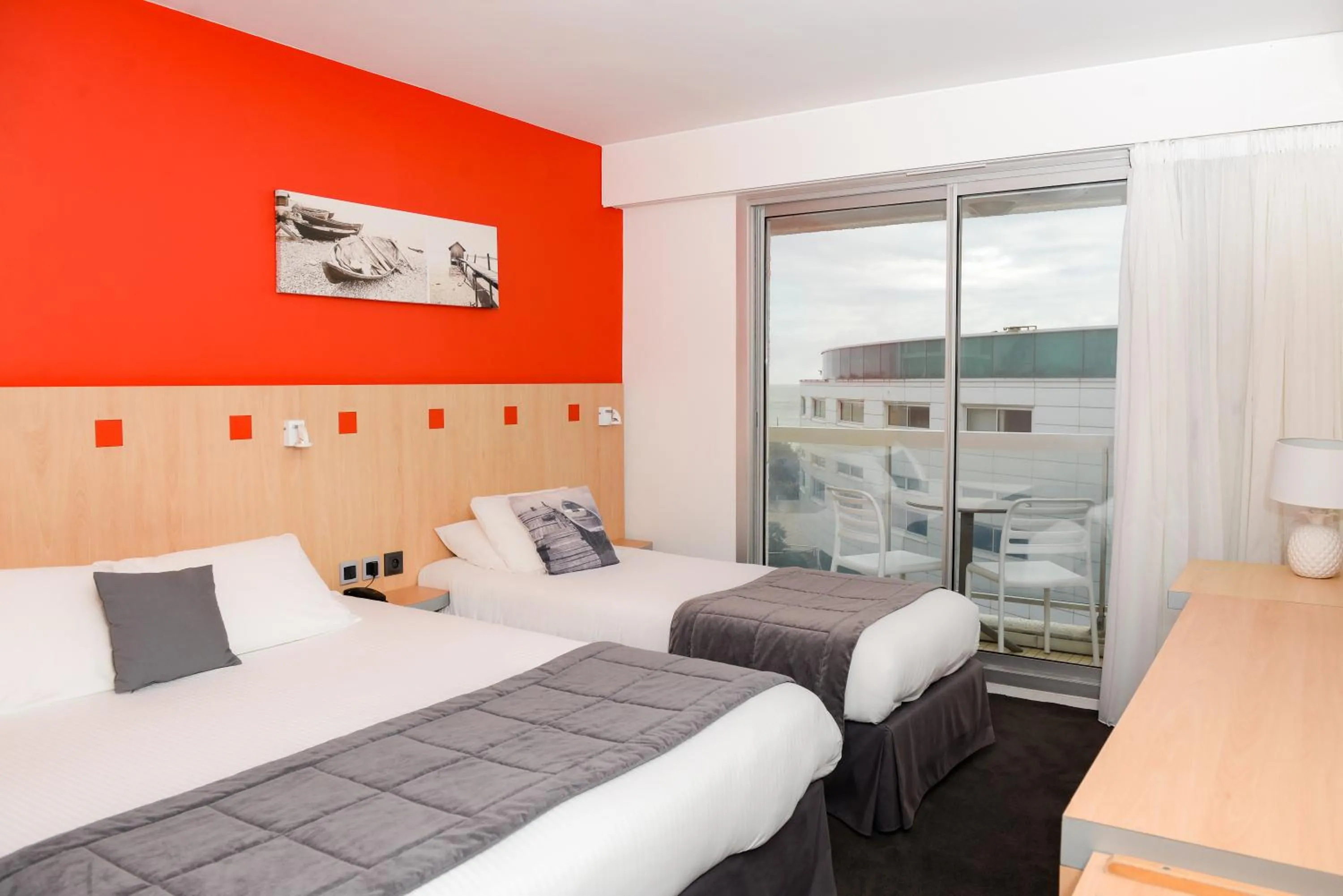 Bedroom, Bed in Kyriad Prestige Les Sables d'Olonne - Plage - Centre des Congrès