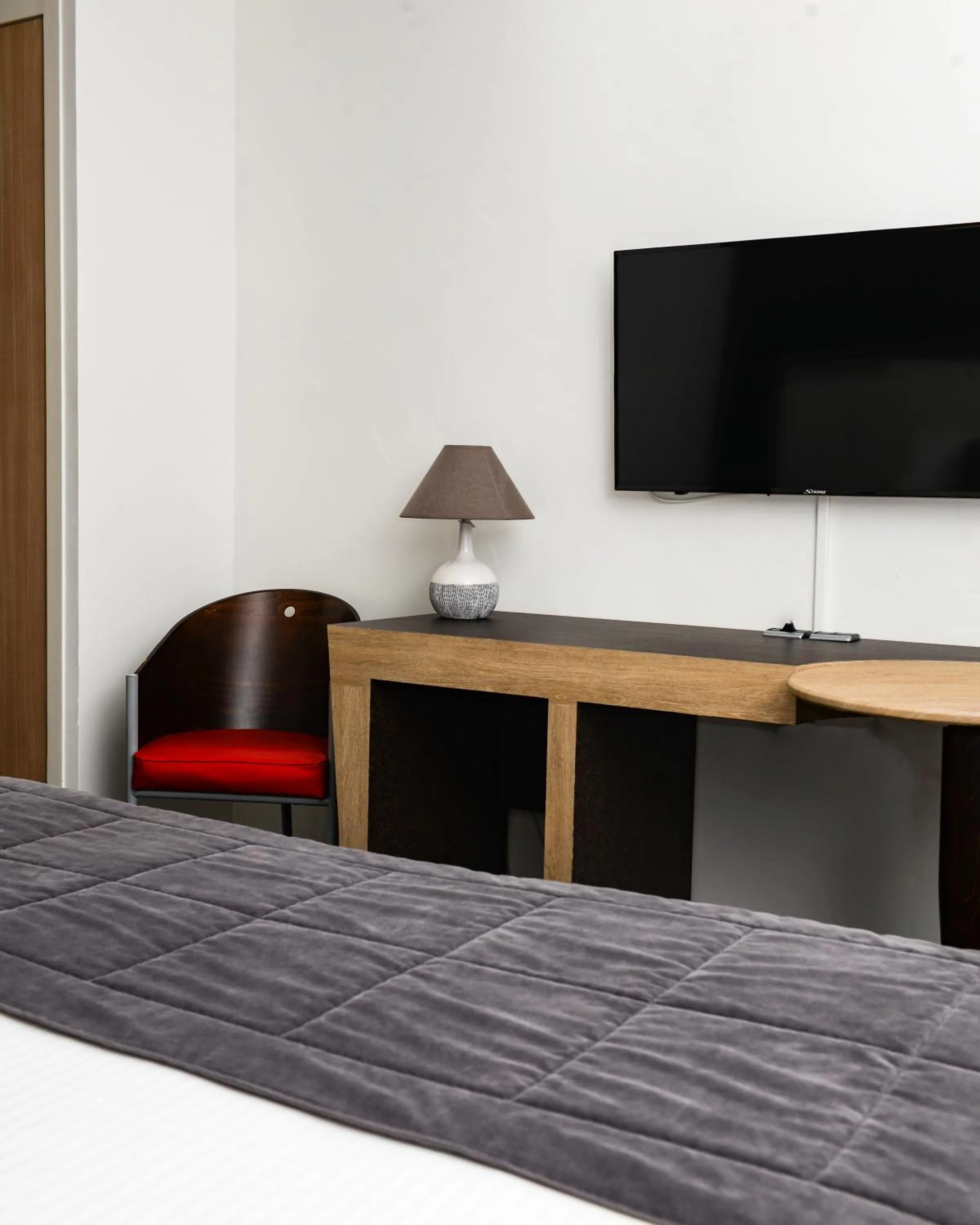 Bedroom in Kyriad Prestige Les Sables d'Olonne - Plage - Centre des Congrès