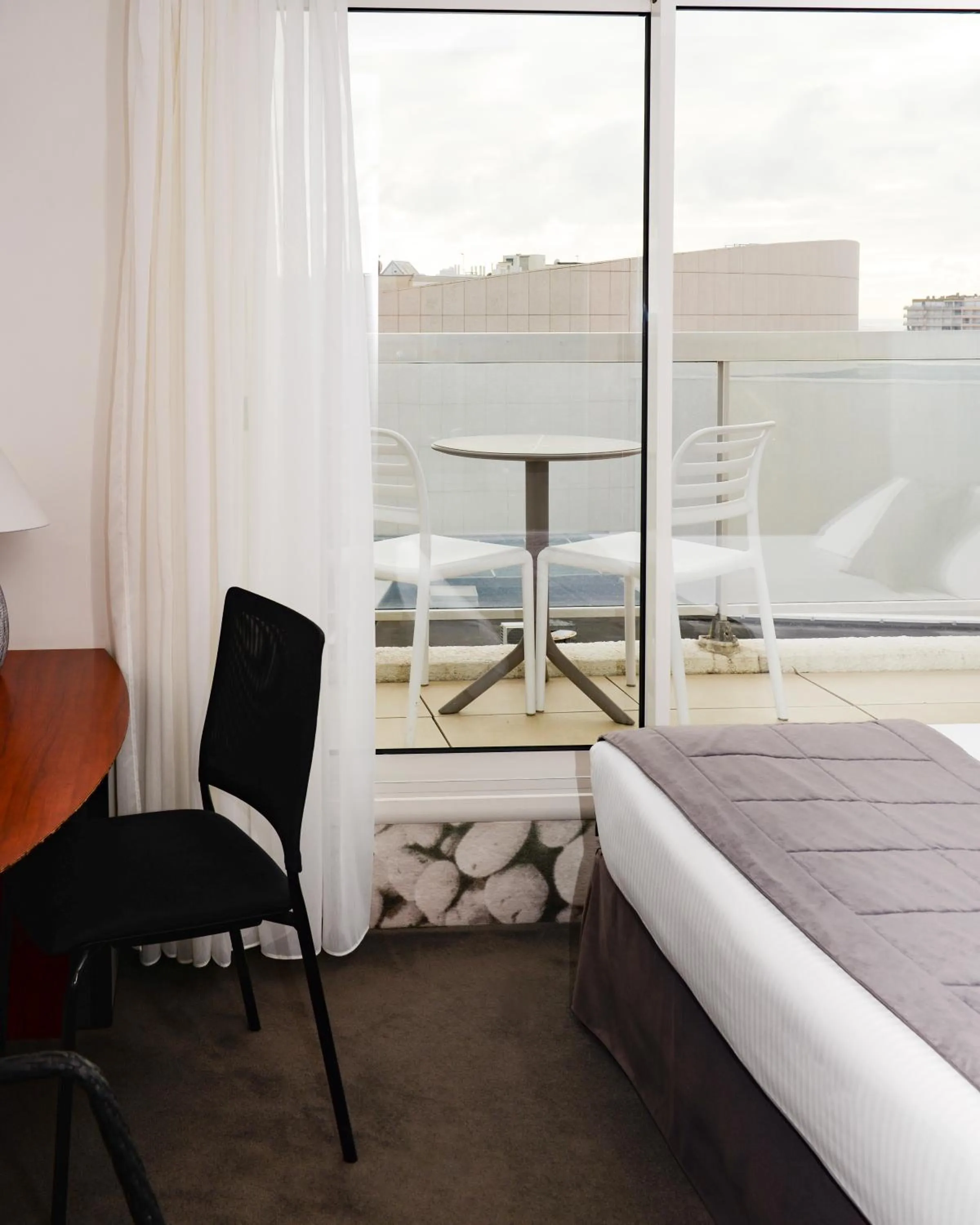 Bedroom, Bed in Kyriad Prestige Les Sables d'Olonne - Plage - Centre des Congrès