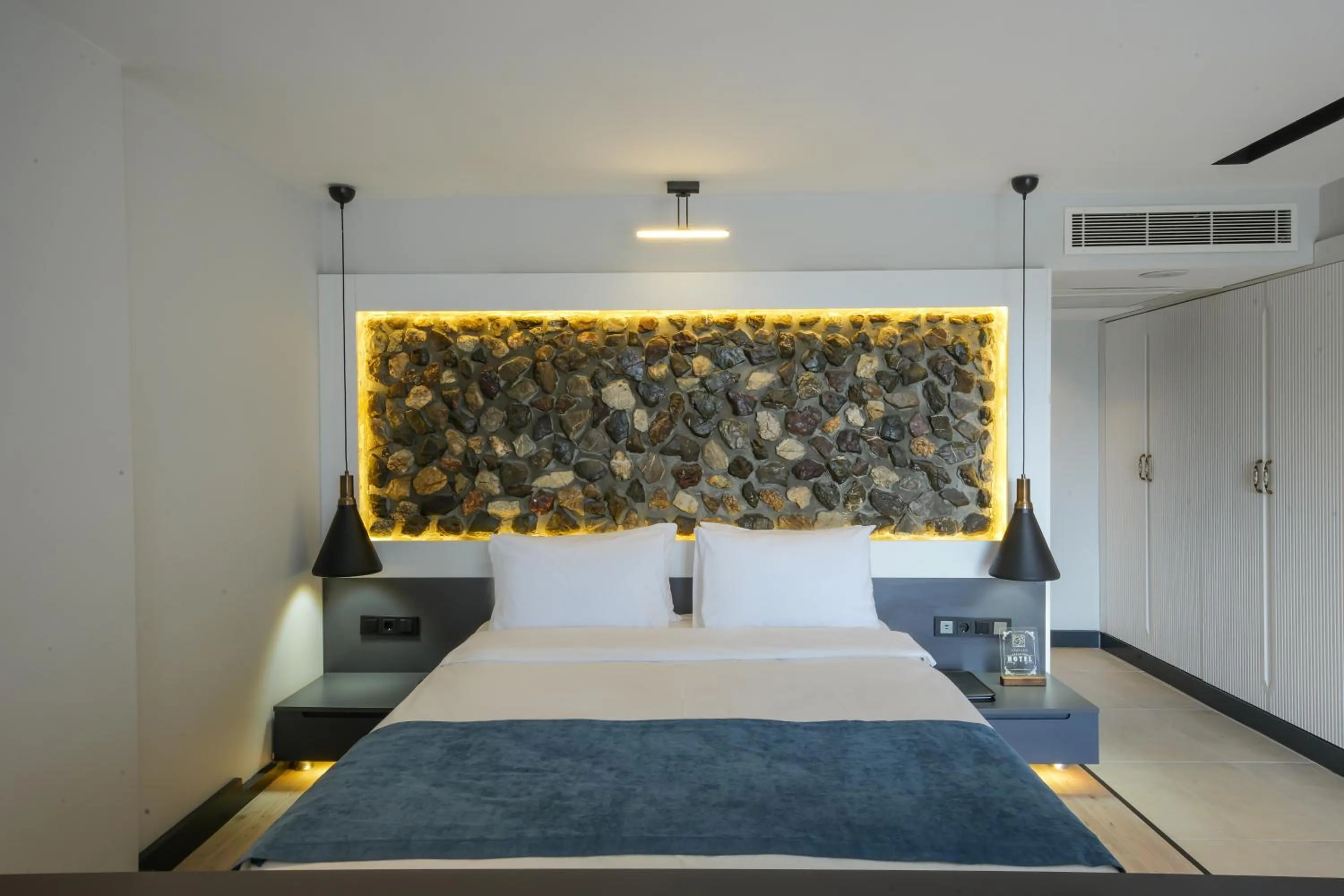 Bed in Ramitos Boutique Hotel