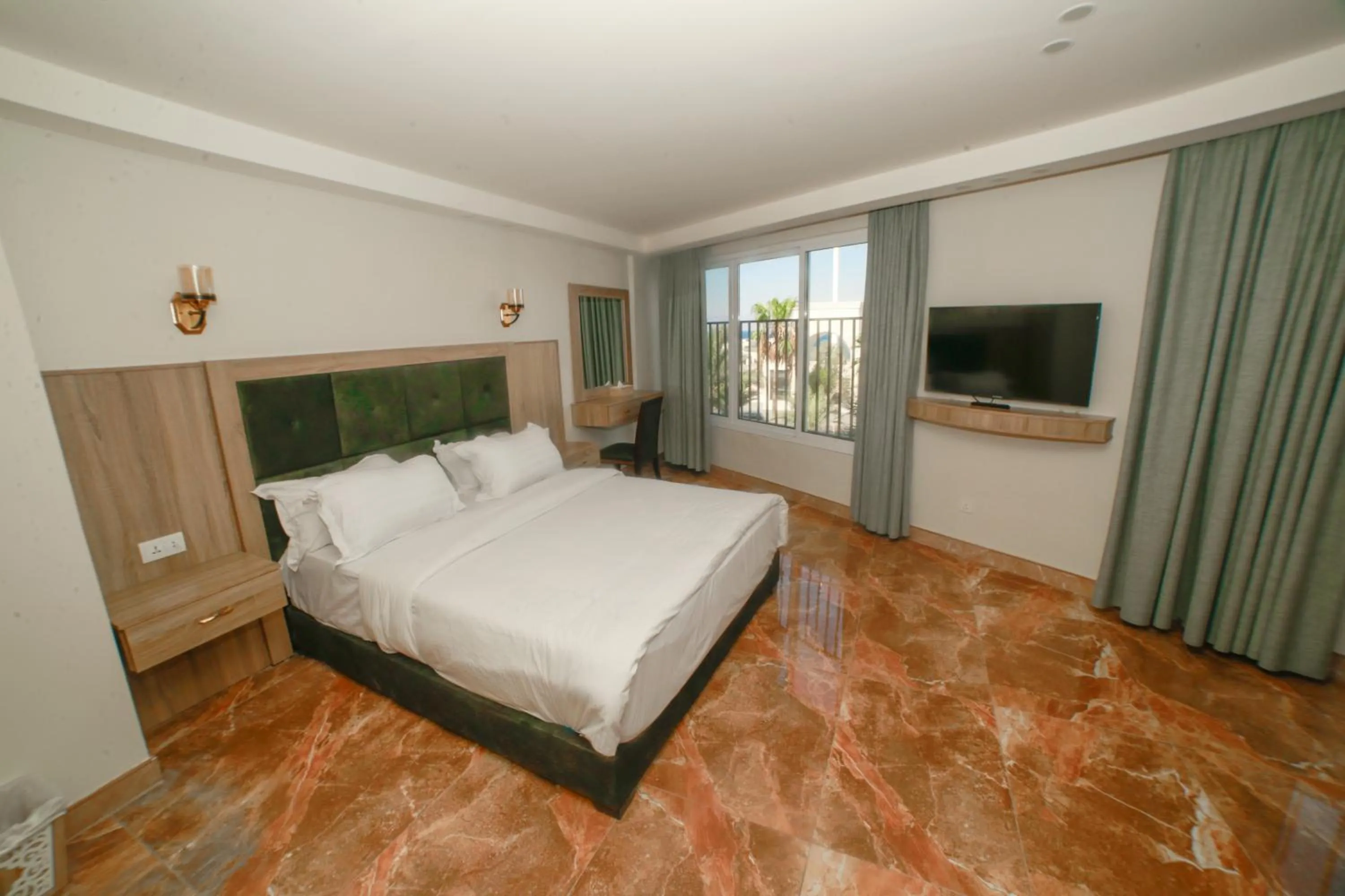 Communal lounge/ TV room in Yafko Hotel