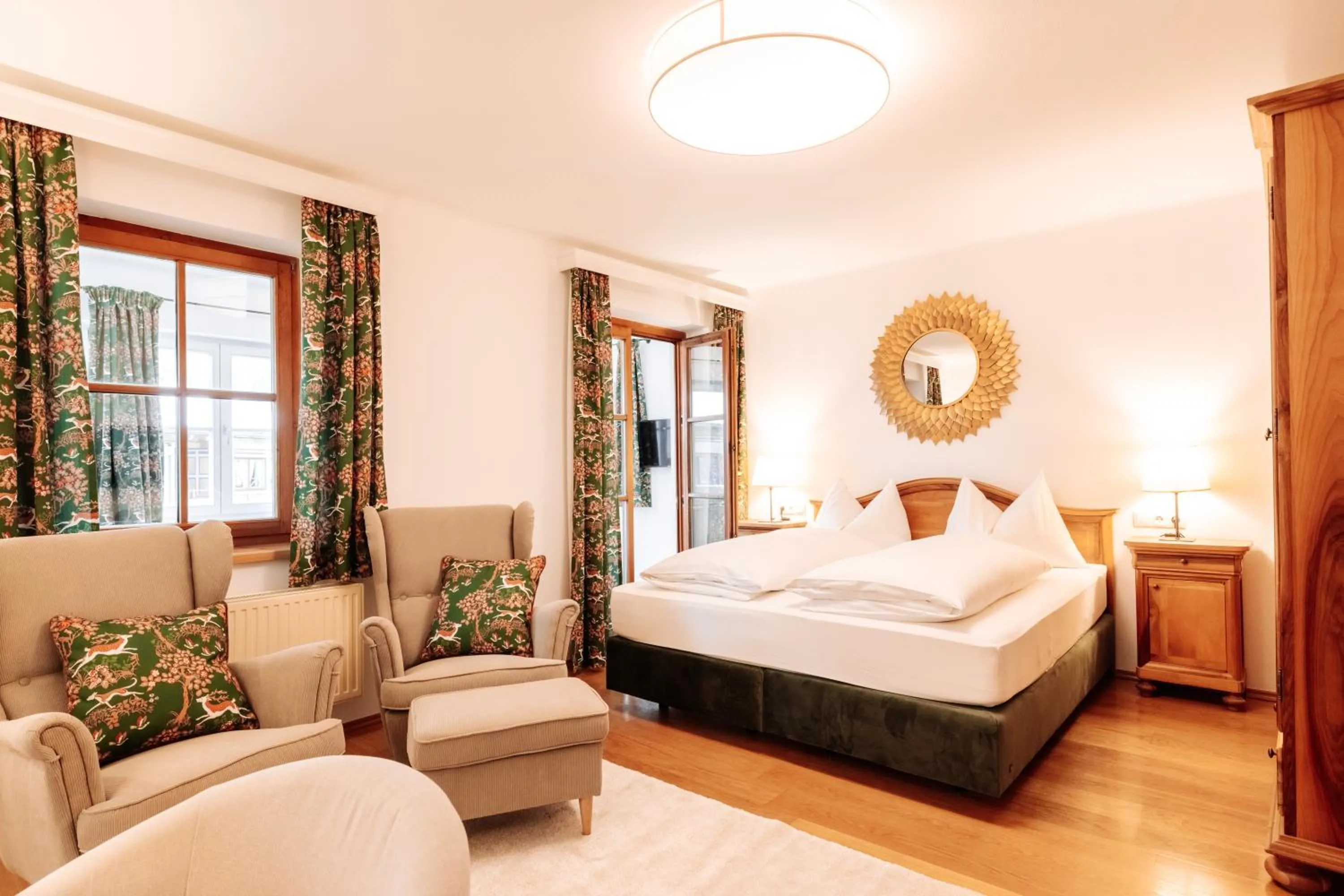 Seating area, Bed in Hubertus Boutiquehotel Filzmoos