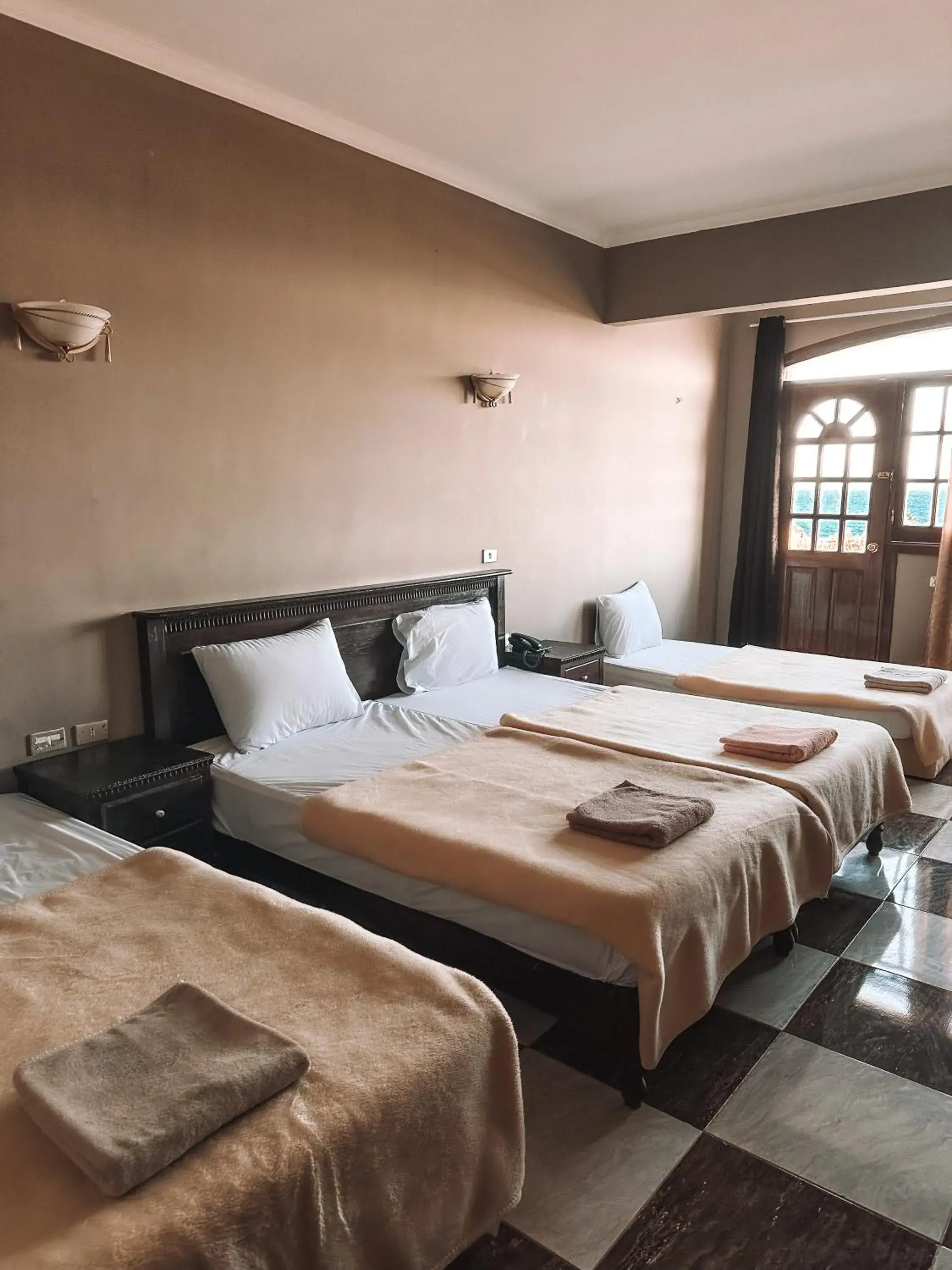 Economy Quadruple Room in Serenity Lodge Economy Quadruple Room in Serenity Lodge