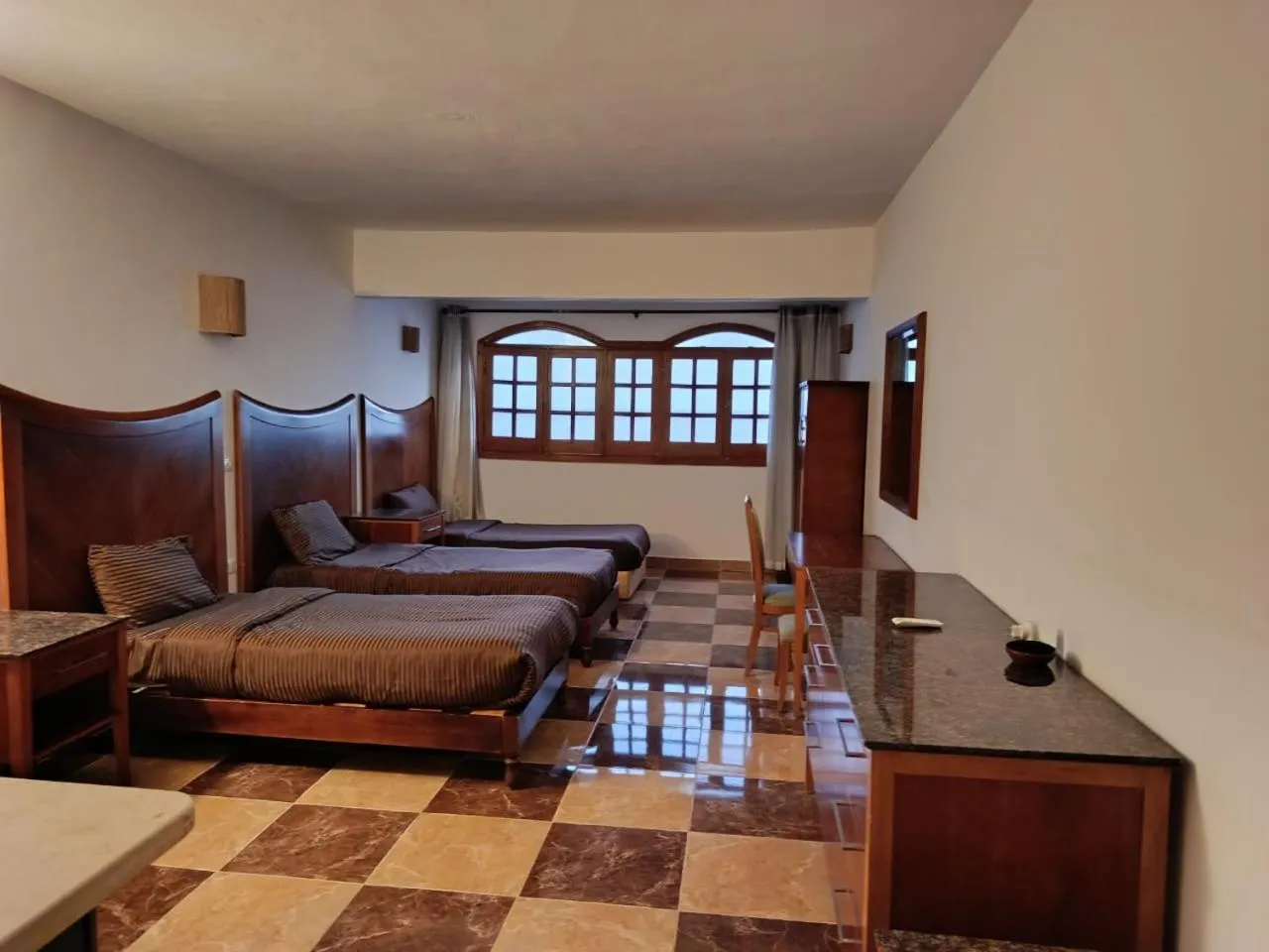 Photo of the whole room, Bed in Serenity Lodge