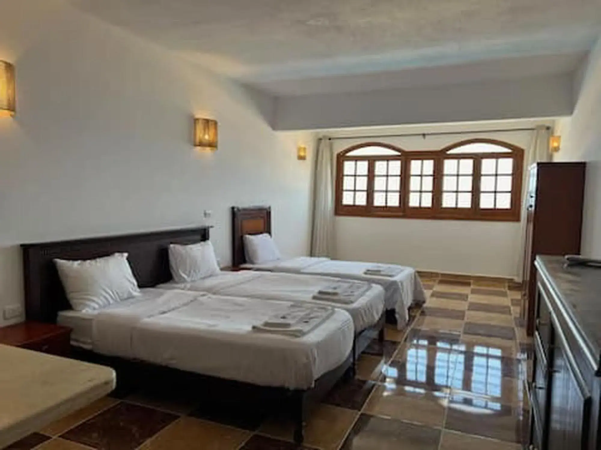 Triple Room with Sea View in Serenity Lodge Triple Room with Sea View in Serenity Lodge