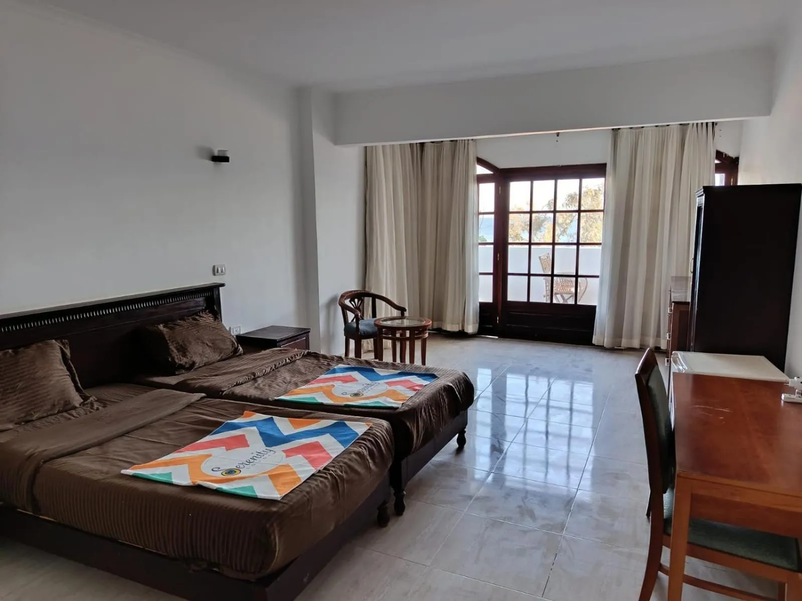 Photo of the whole room, Bed in Serenity Lodge