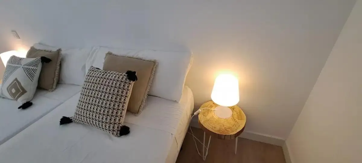 Bed in La Arena Apartamentos Zierbena