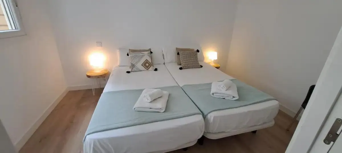 Bed in La Arena Apartamentos Zierbena