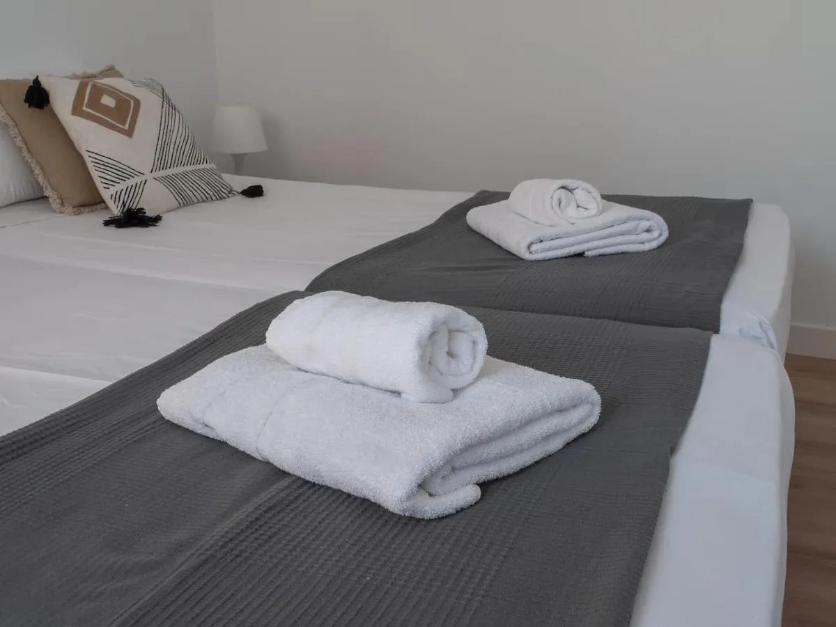 Bed in La Arena Apartamentos Zierbena