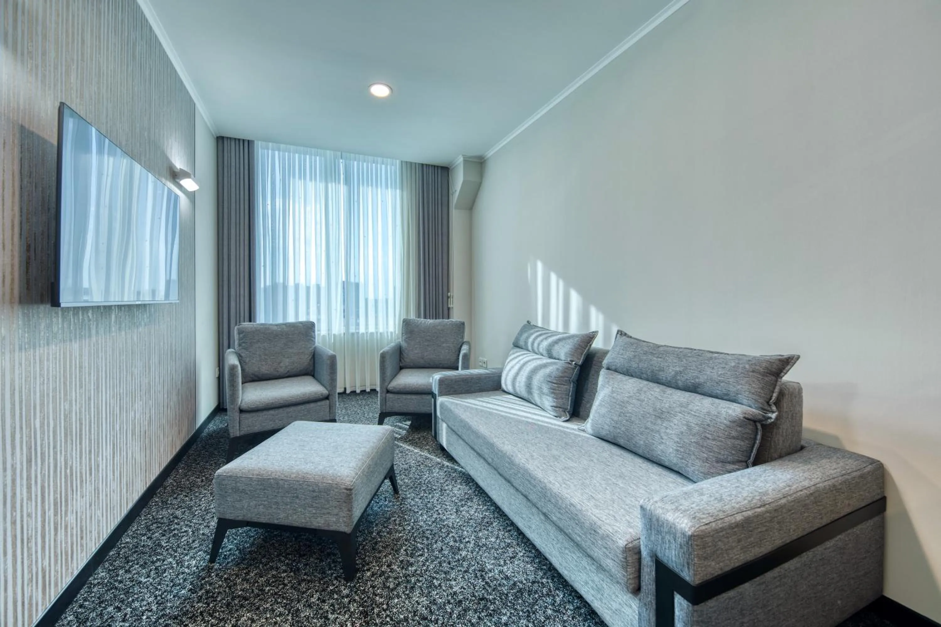 Living room in Expocore Hotel