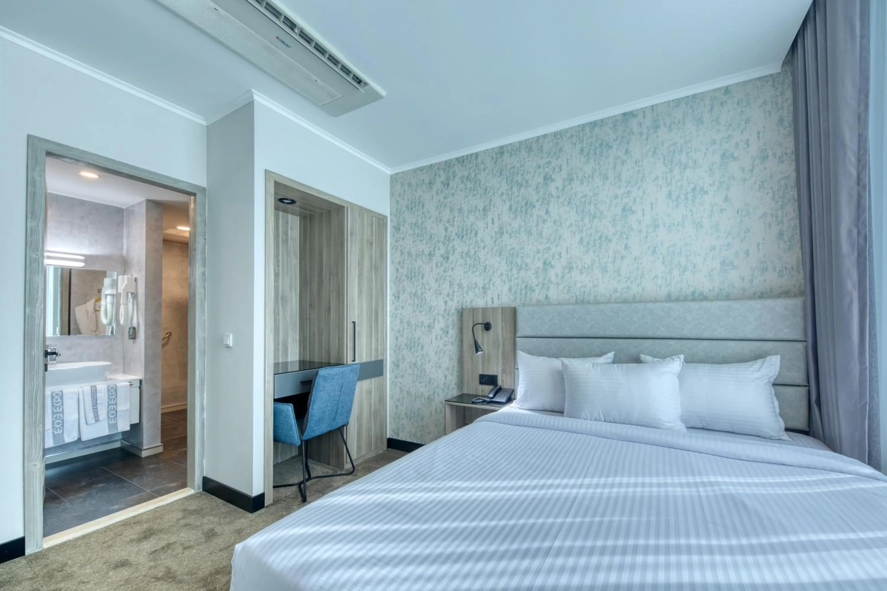 Bed in Expocore Hotel