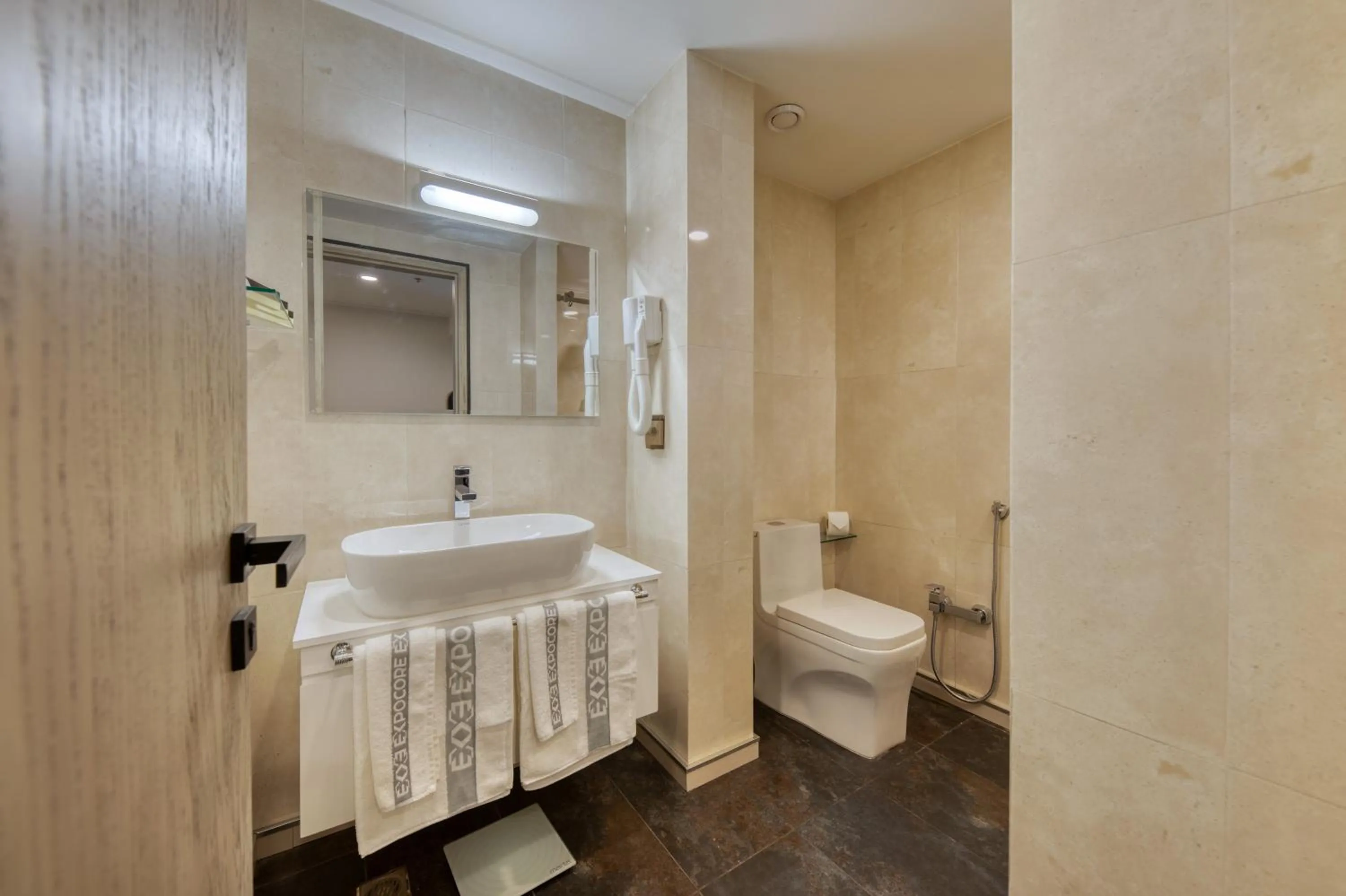 Toilet in Expocore Hotel