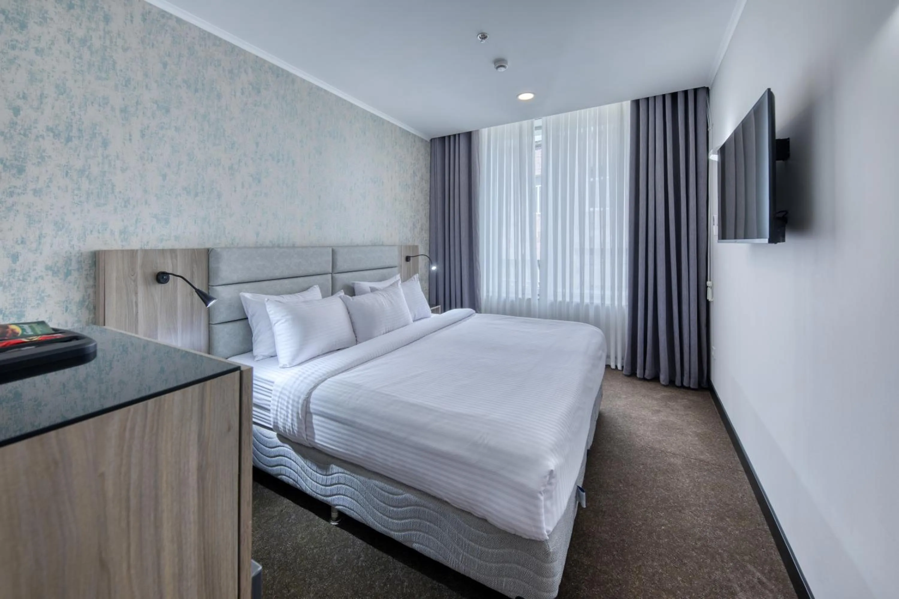 Photo of the whole room, Bed in Expocore Hotel