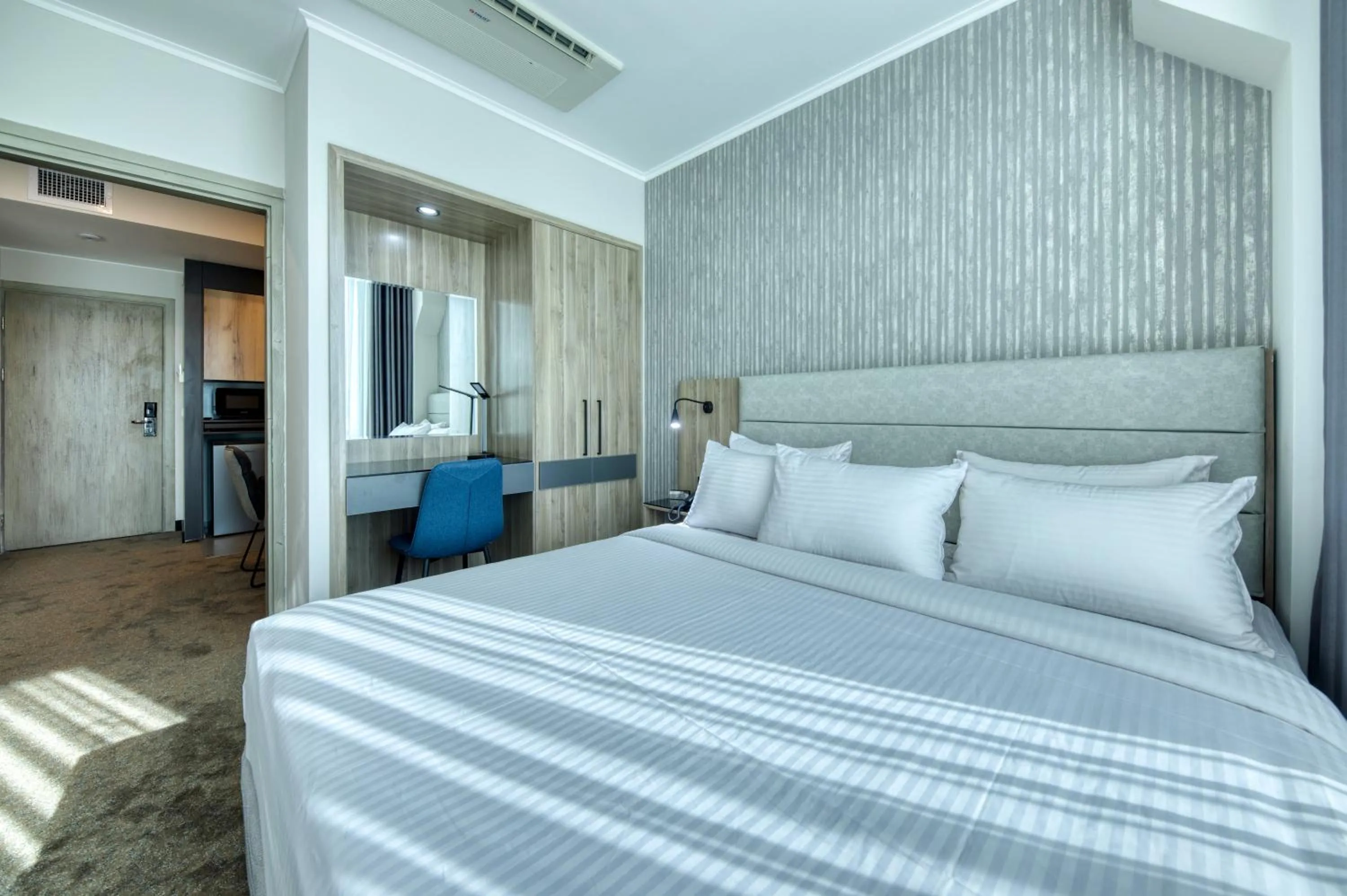 Bedroom, Bed in Expocore Hotel