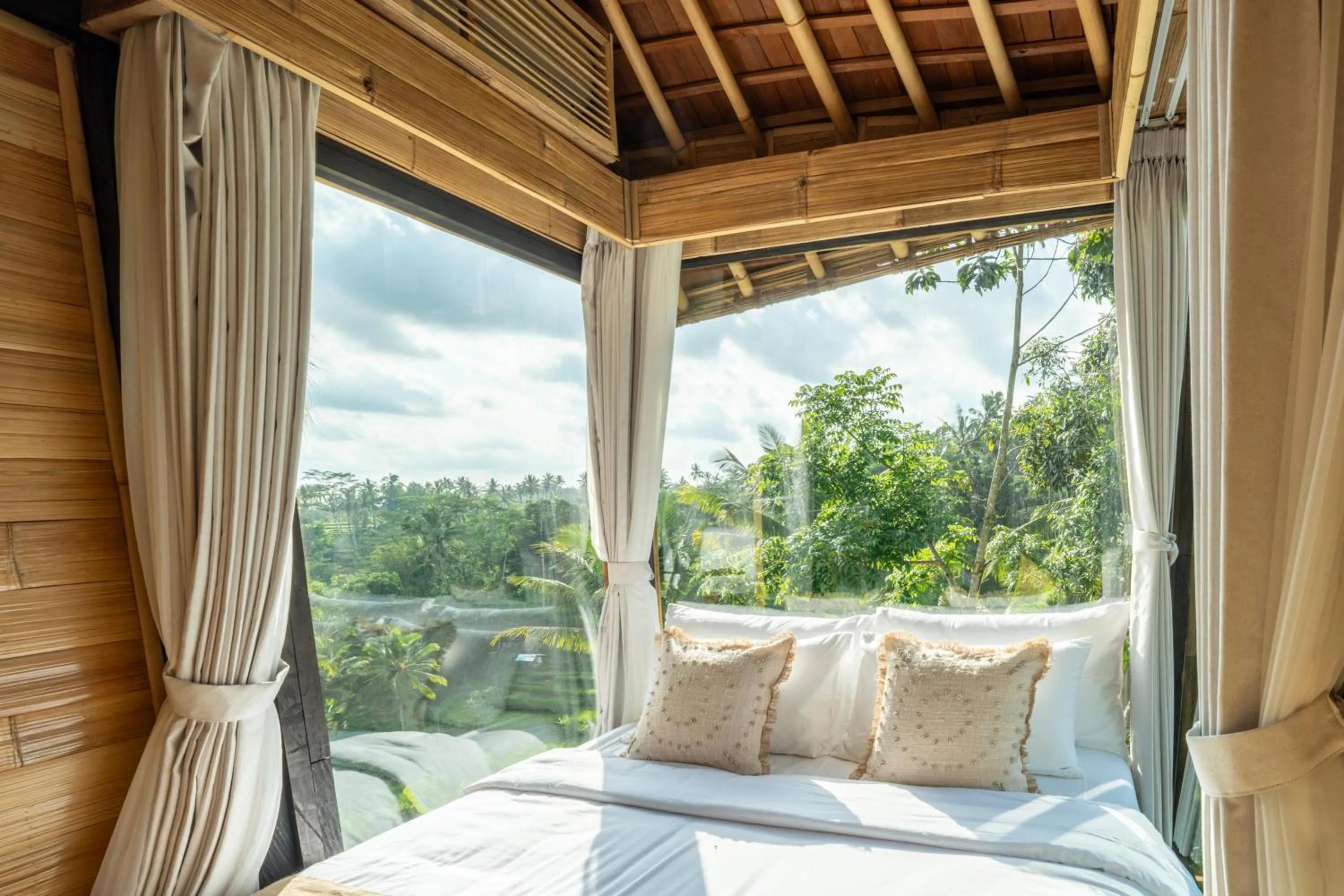 Bedroom in Bambootel Sawah View