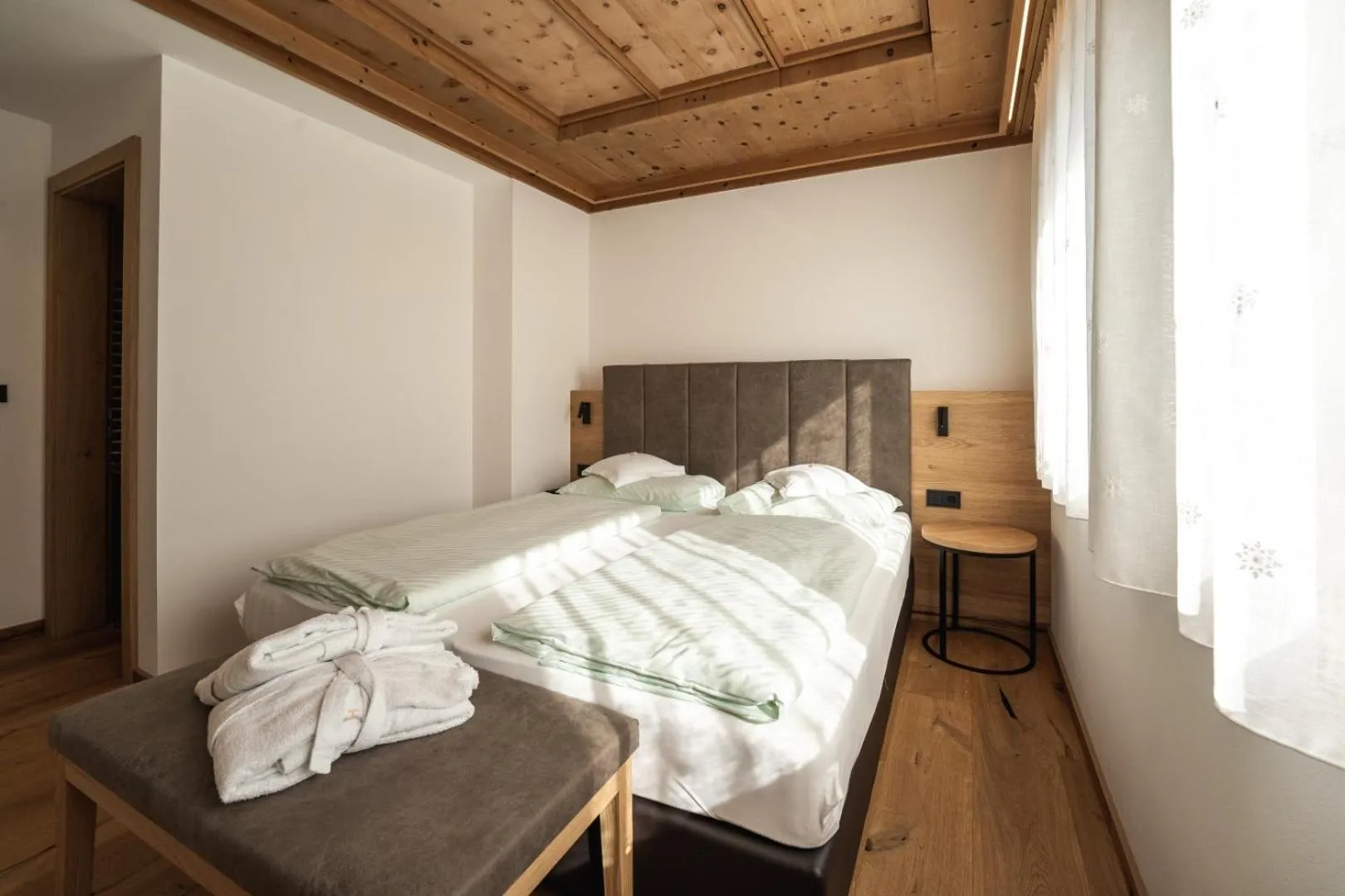 Bed in Aparthotel Zum Schlössl