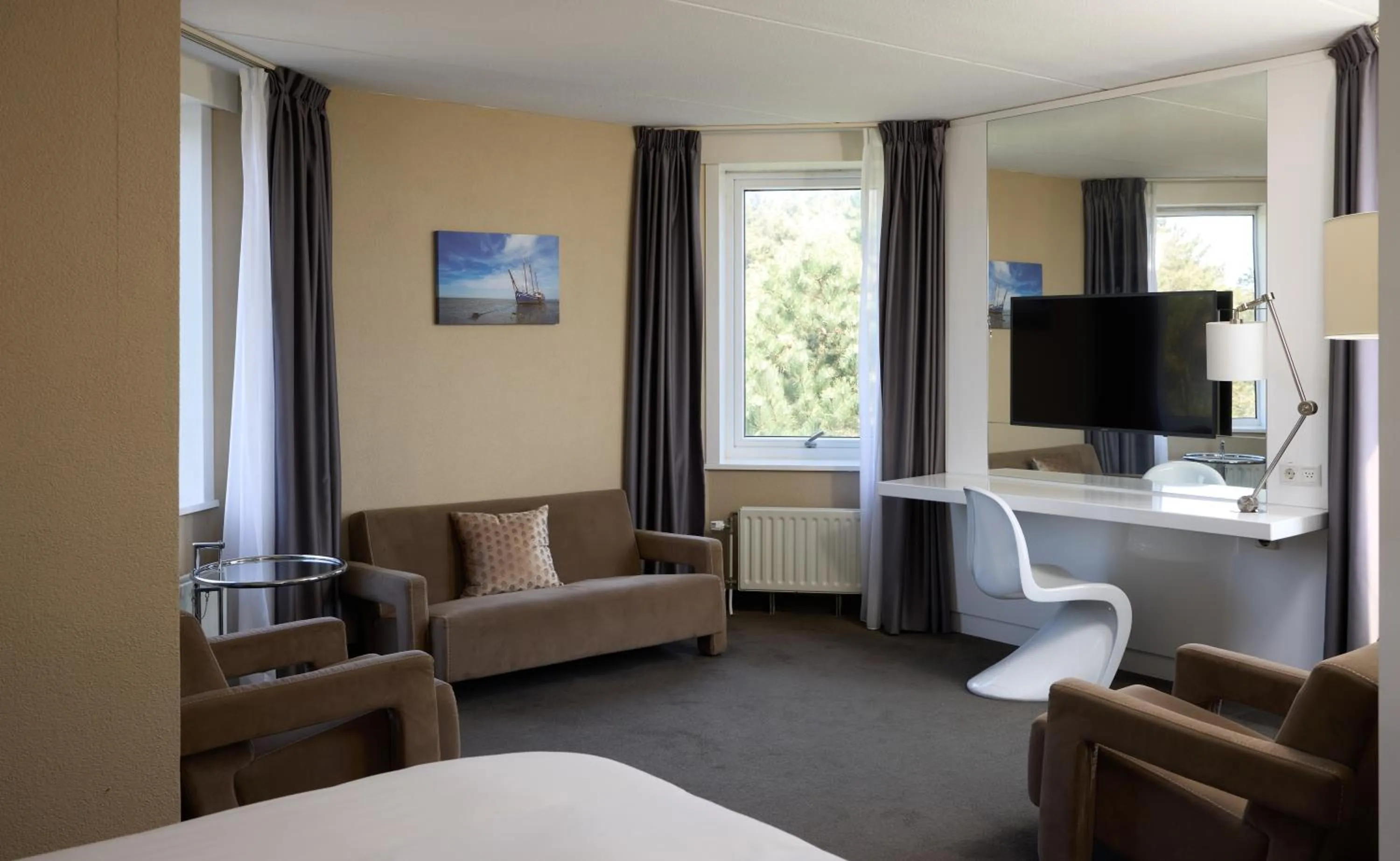 Living room, Bed in WestCord Hotel Schylge