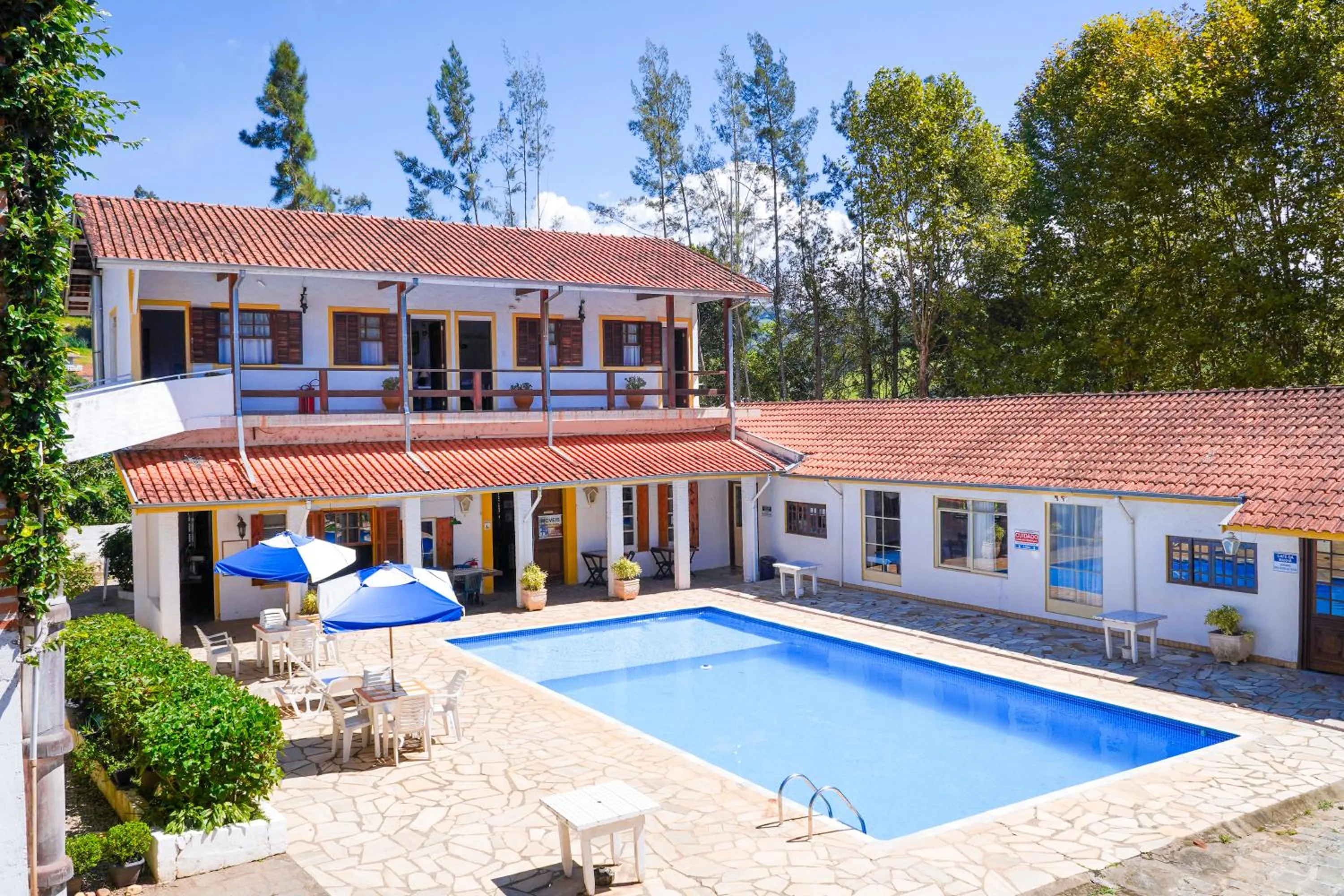 Swimming pool in VELINN Pousada Cesar