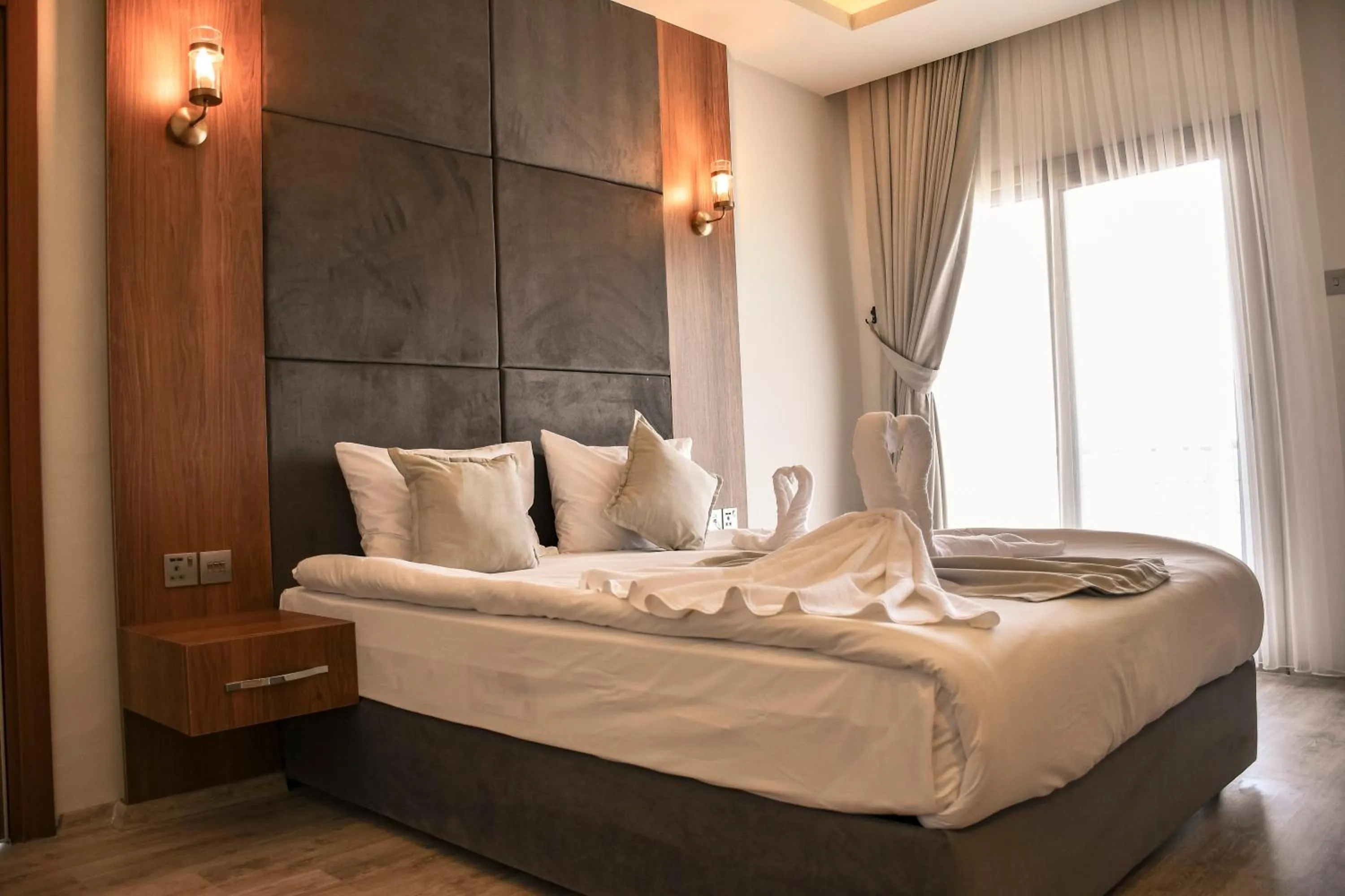 Bed in Mimoza Beach Hotel