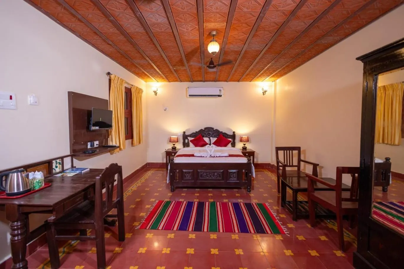 Bed in CHETTINAD HERITAGE WELLNESS RESORTS