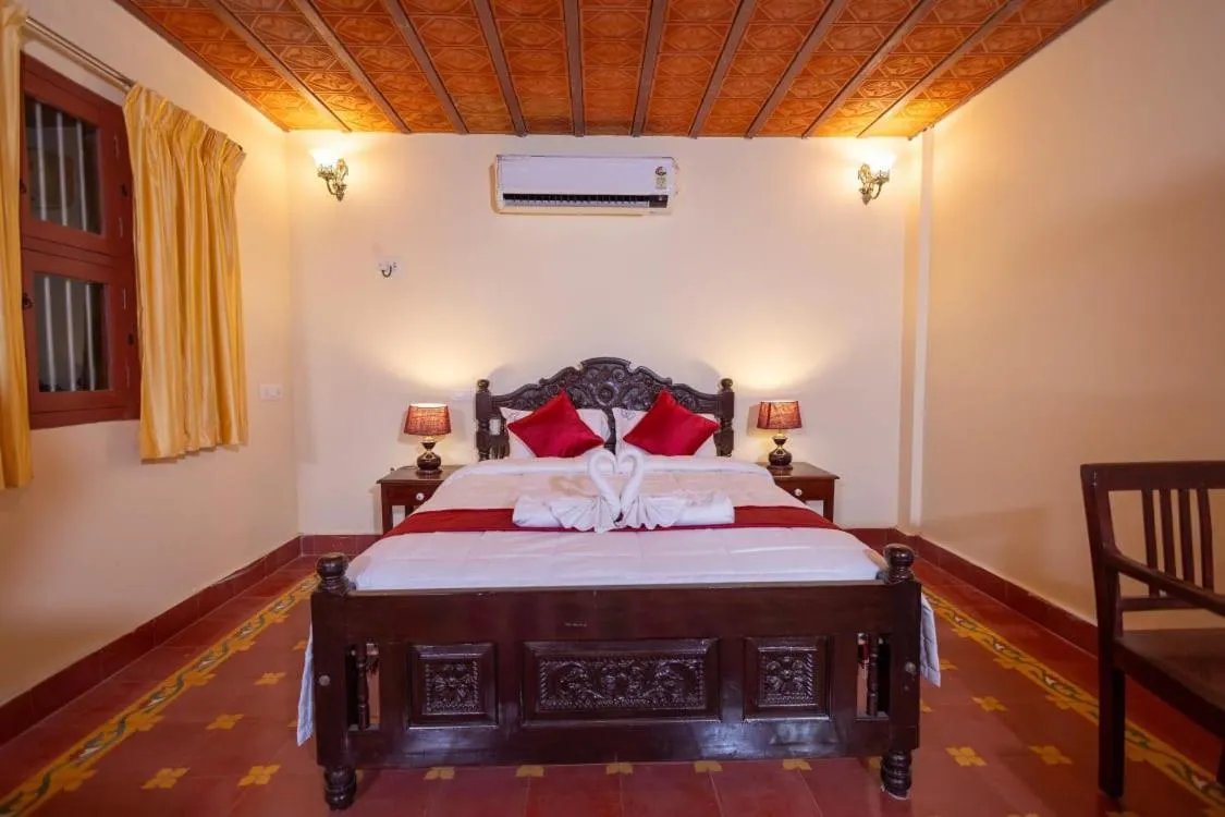 Bed in CHETTINAD HERITAGE WELLNESS RESORTS