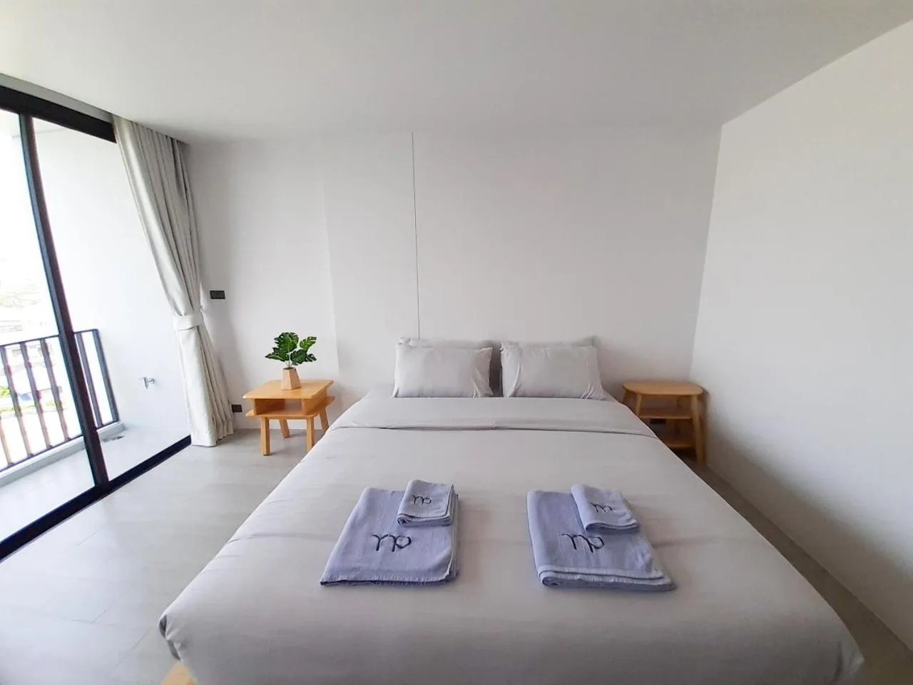 Bed in Tassanaplace Boutique Hotel (ฺBansuan)
