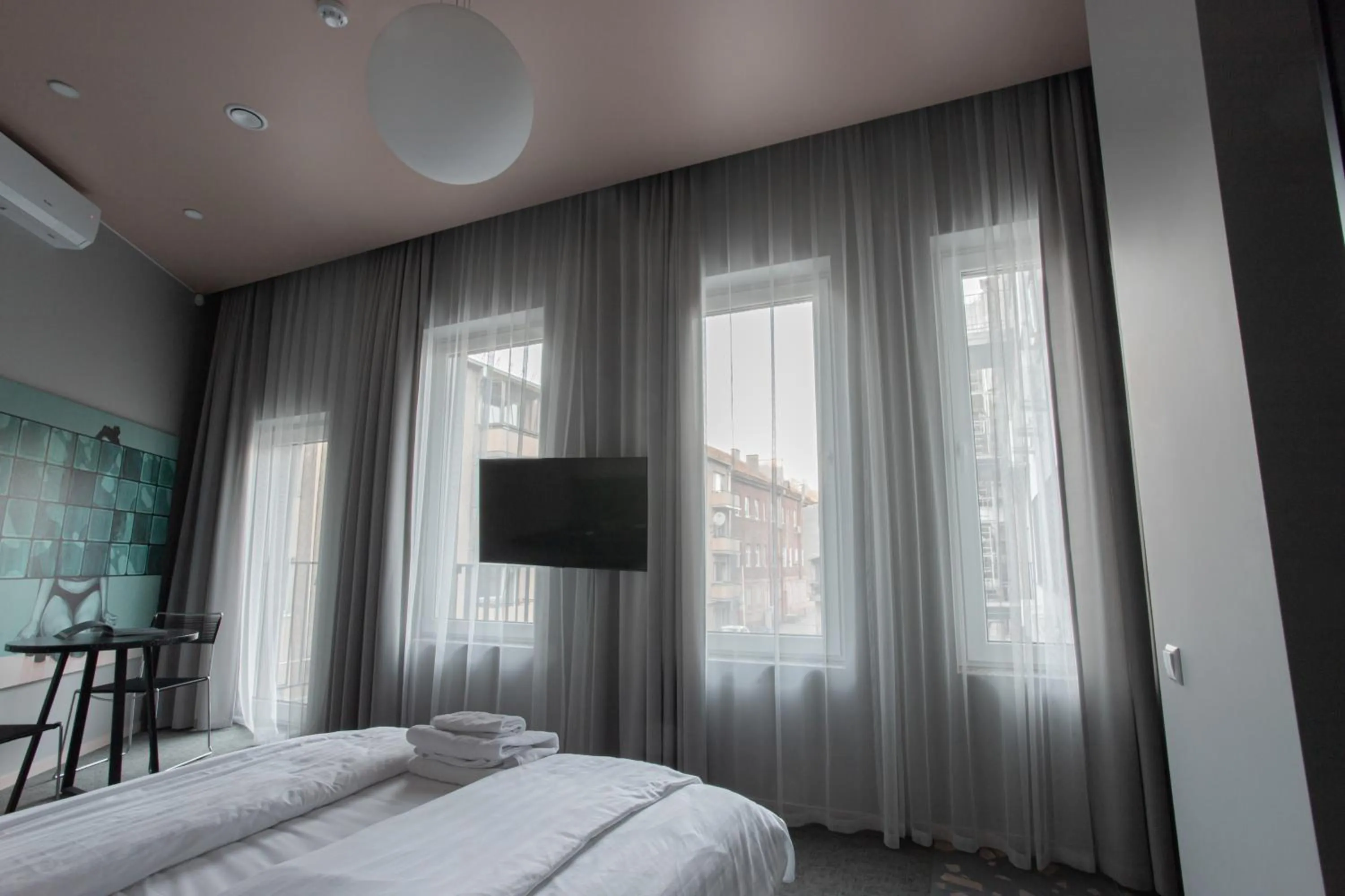 Photo of the whole room, Bed in Resume apartments