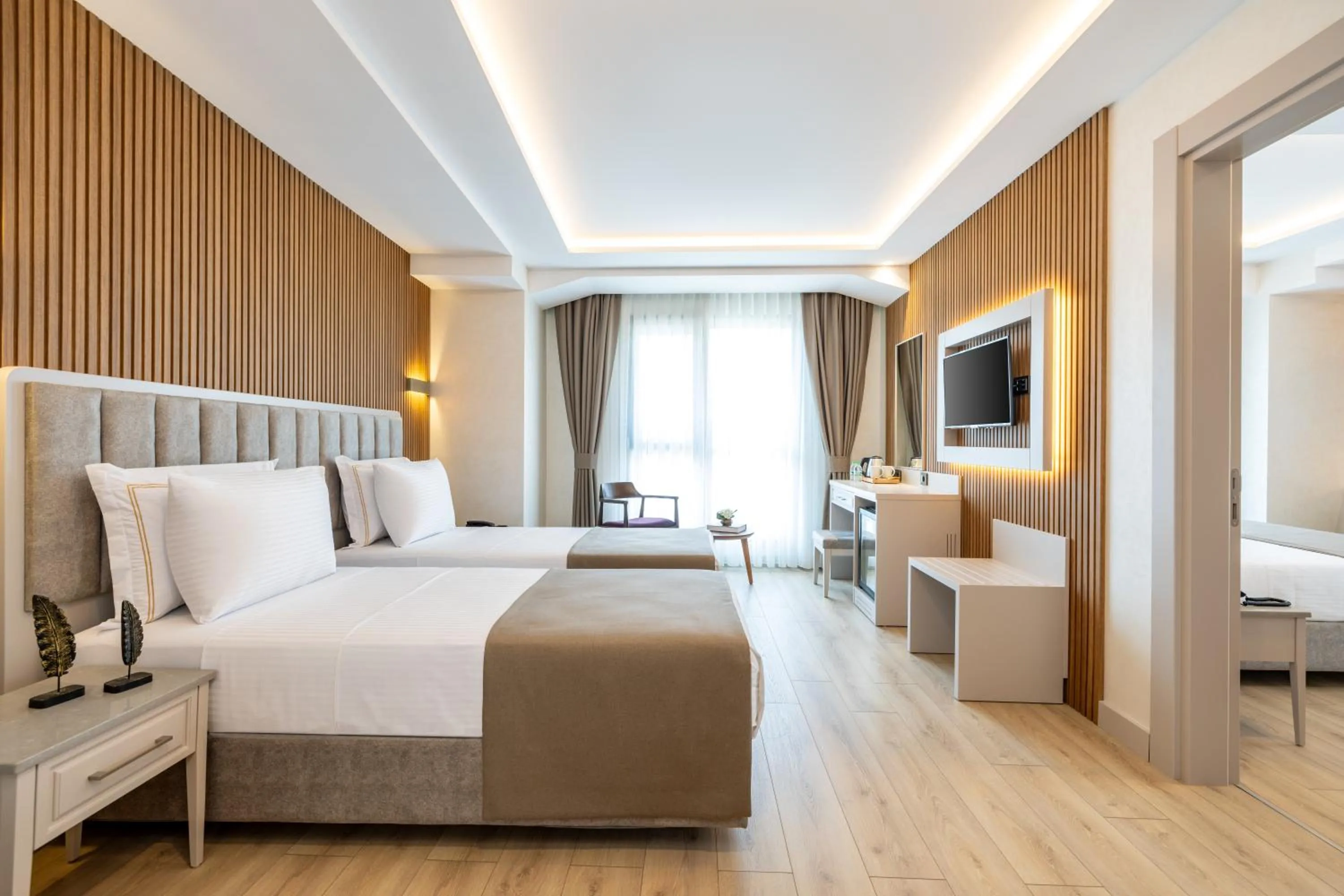 Bed in Carina Gold Hotel And Restaurant