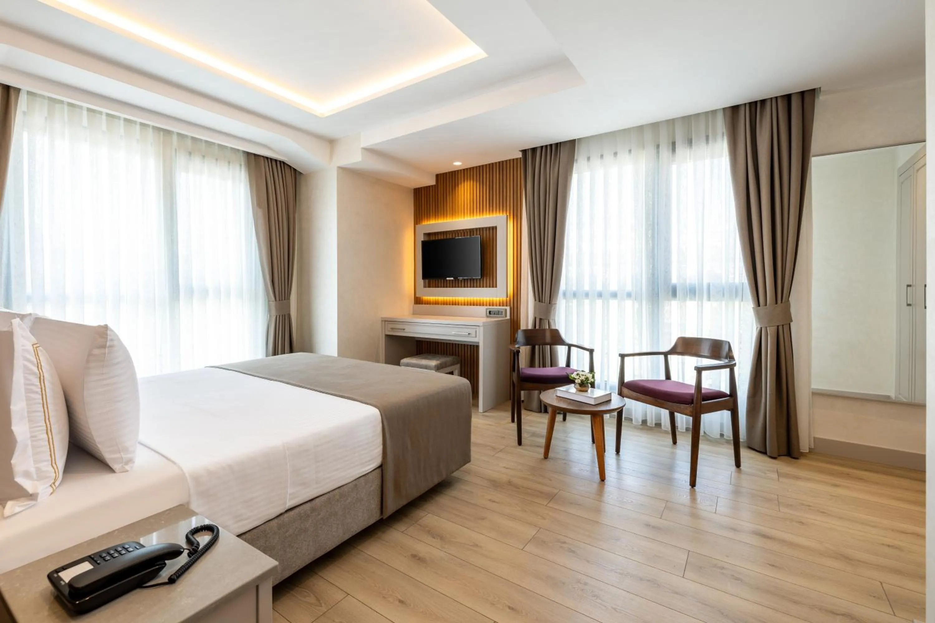 Bed in Carina Gold Hotel And Restaurant