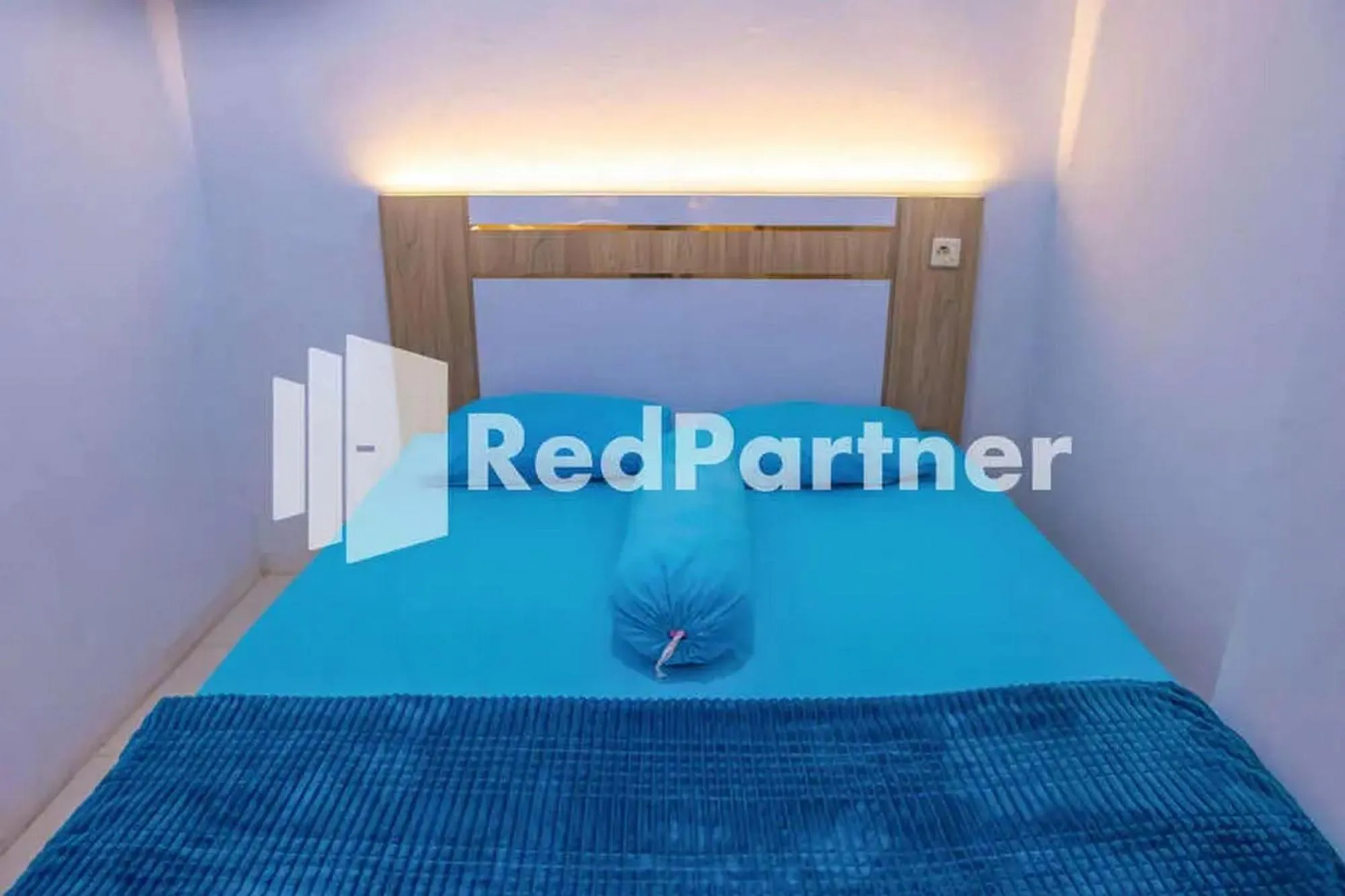 Bed in Hotel Rai's Palopo Exclusive Mitra RedDoorz