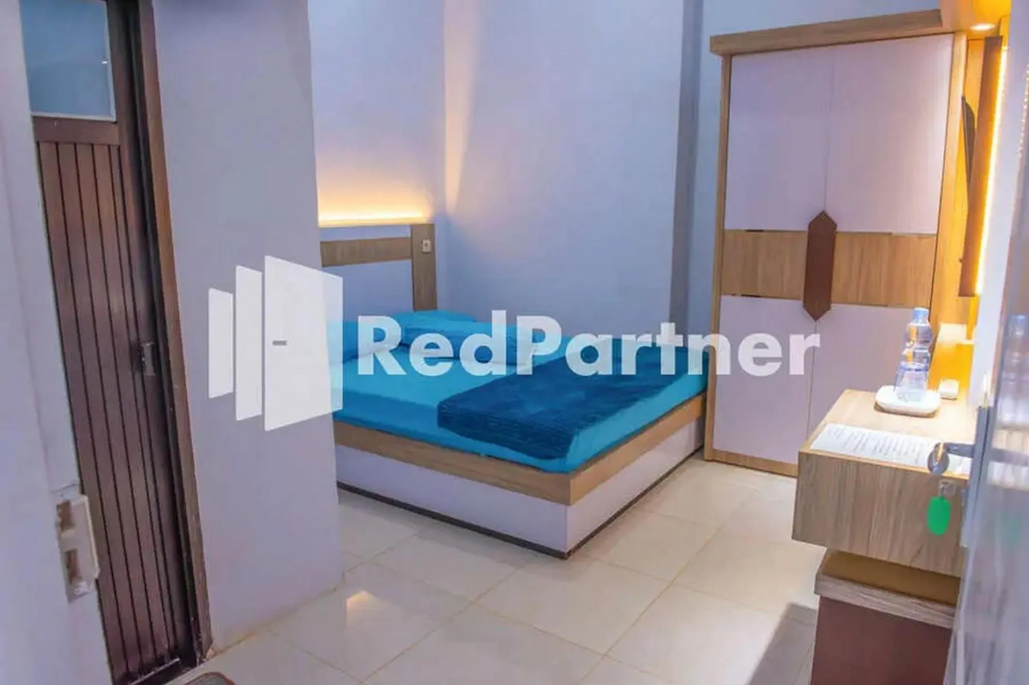 Bed in Hotel Rai's Palopo Exclusive Mitra RedDoorz