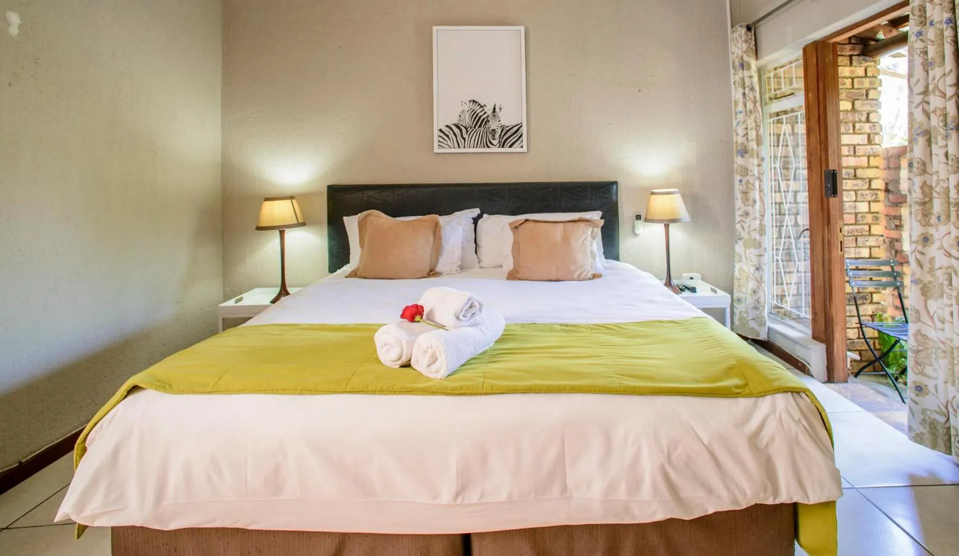 Bed in Zebrina Guest House